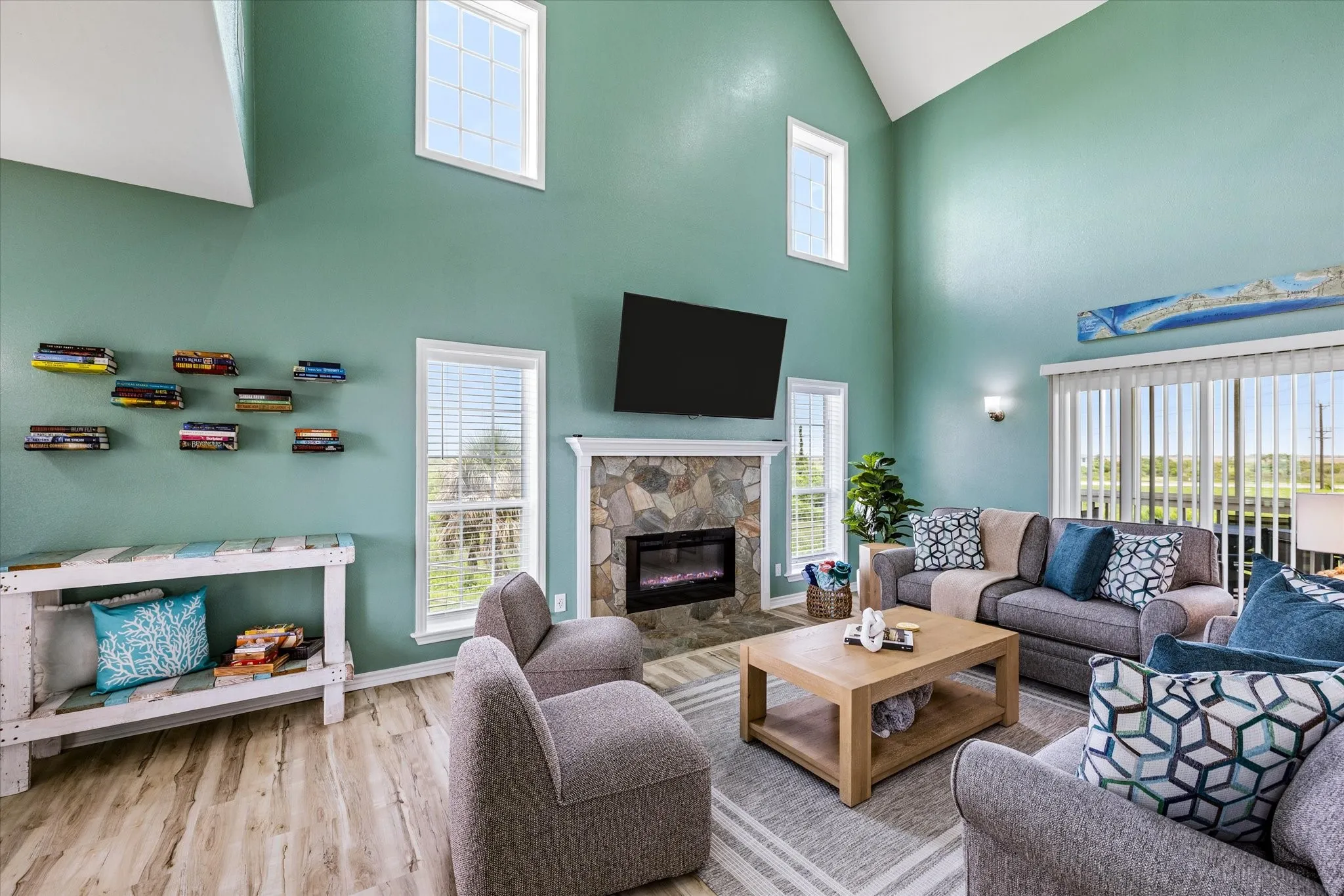 Cozy electric fireplace with comfy couch, throws and a good book!