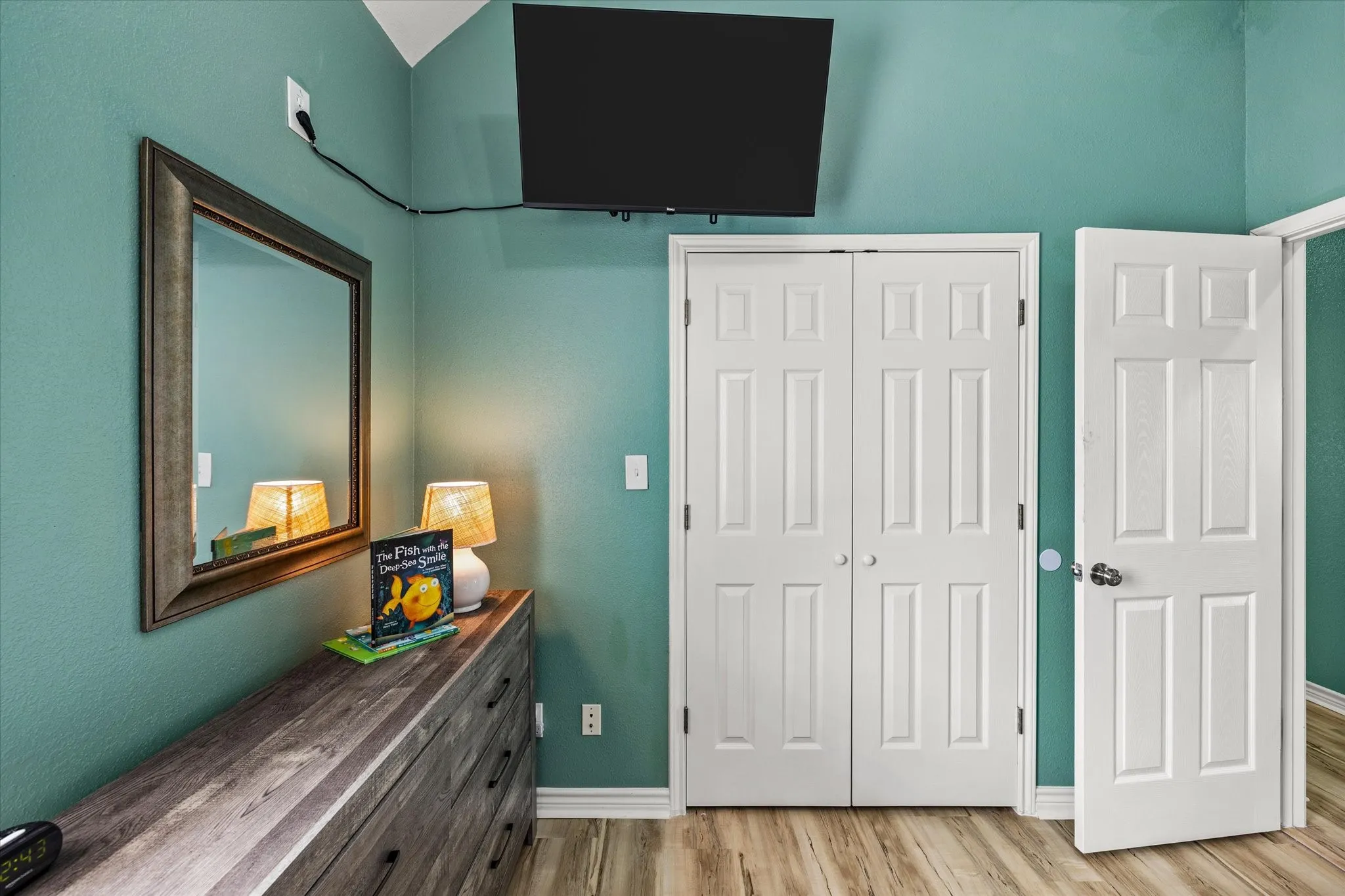 Smart TVs in every bedroom. Closet, hangers and dresser with plenty of room