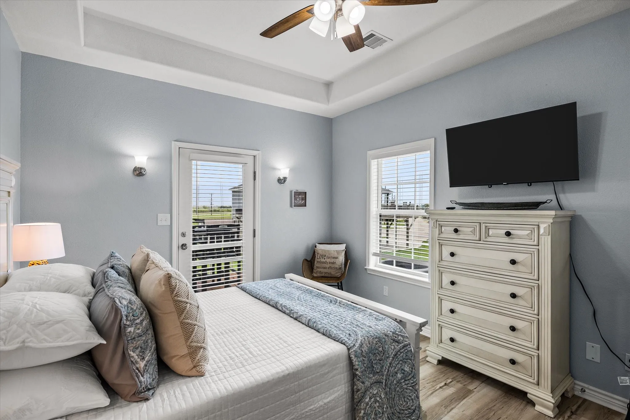Bedroom 2 with closet, hangers and dresser ready for you to settle in