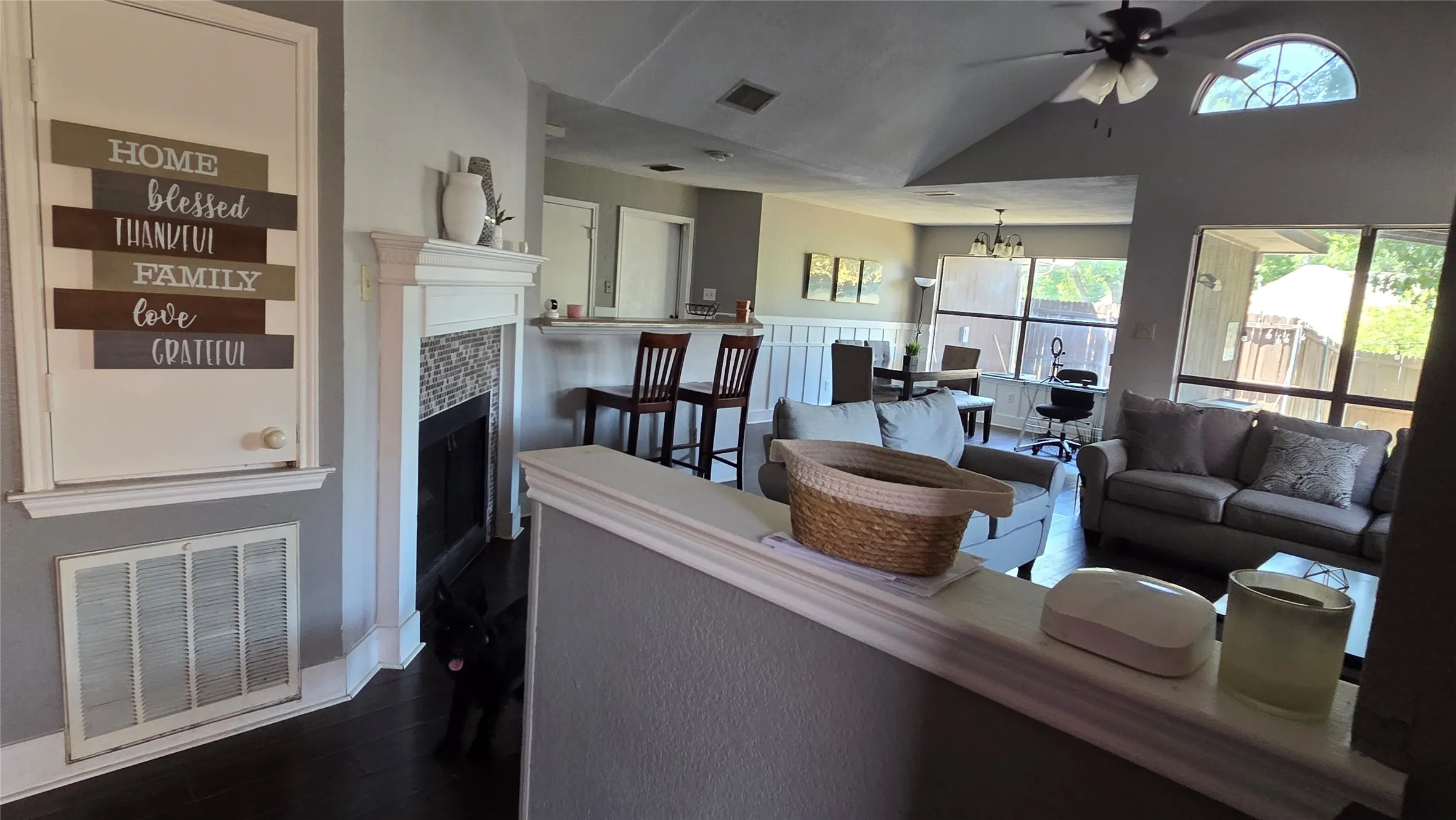 Fireplace with a tile surround and mantel