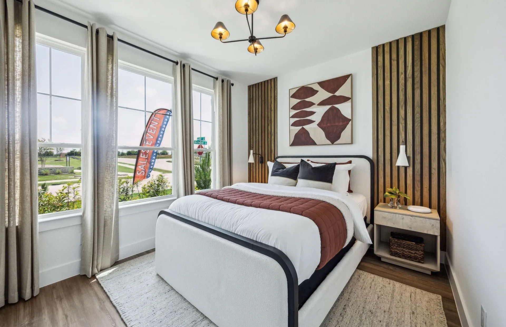 *Model Representation - Spacious secondary bedroom with large windows