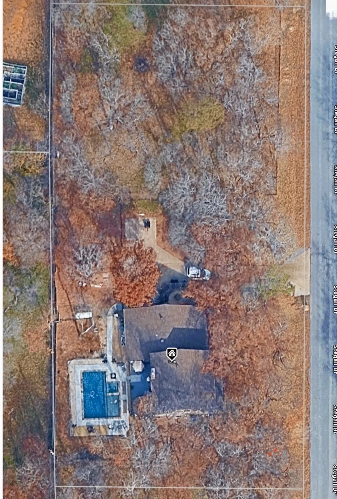 .83 acres backing to large private lot--country living!