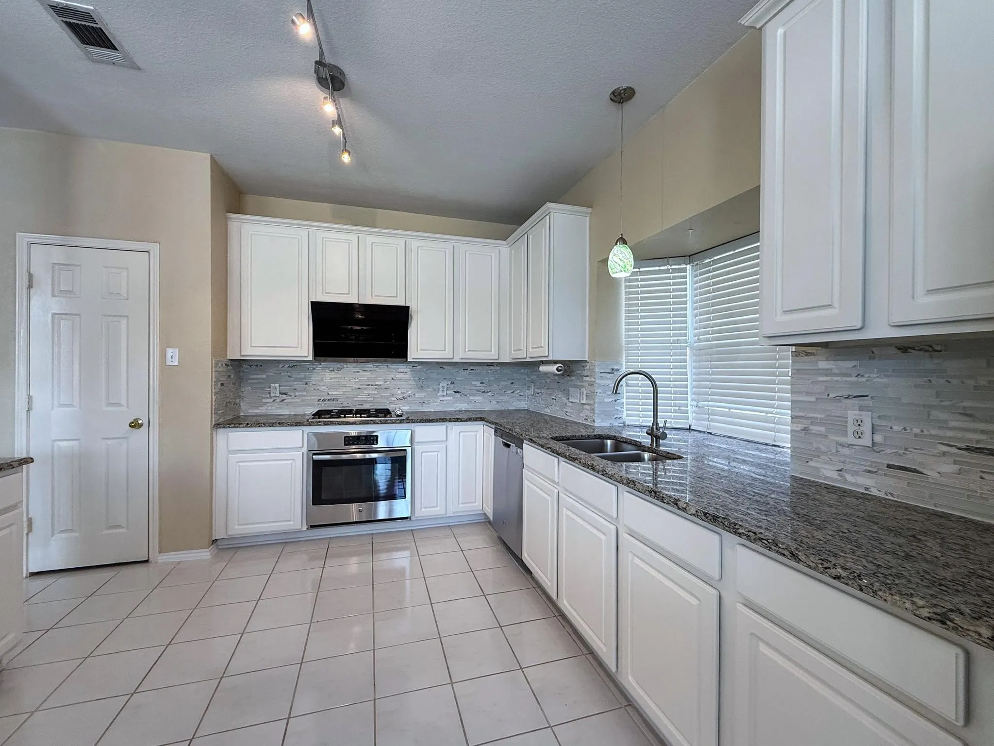 Kitchen with granite counters