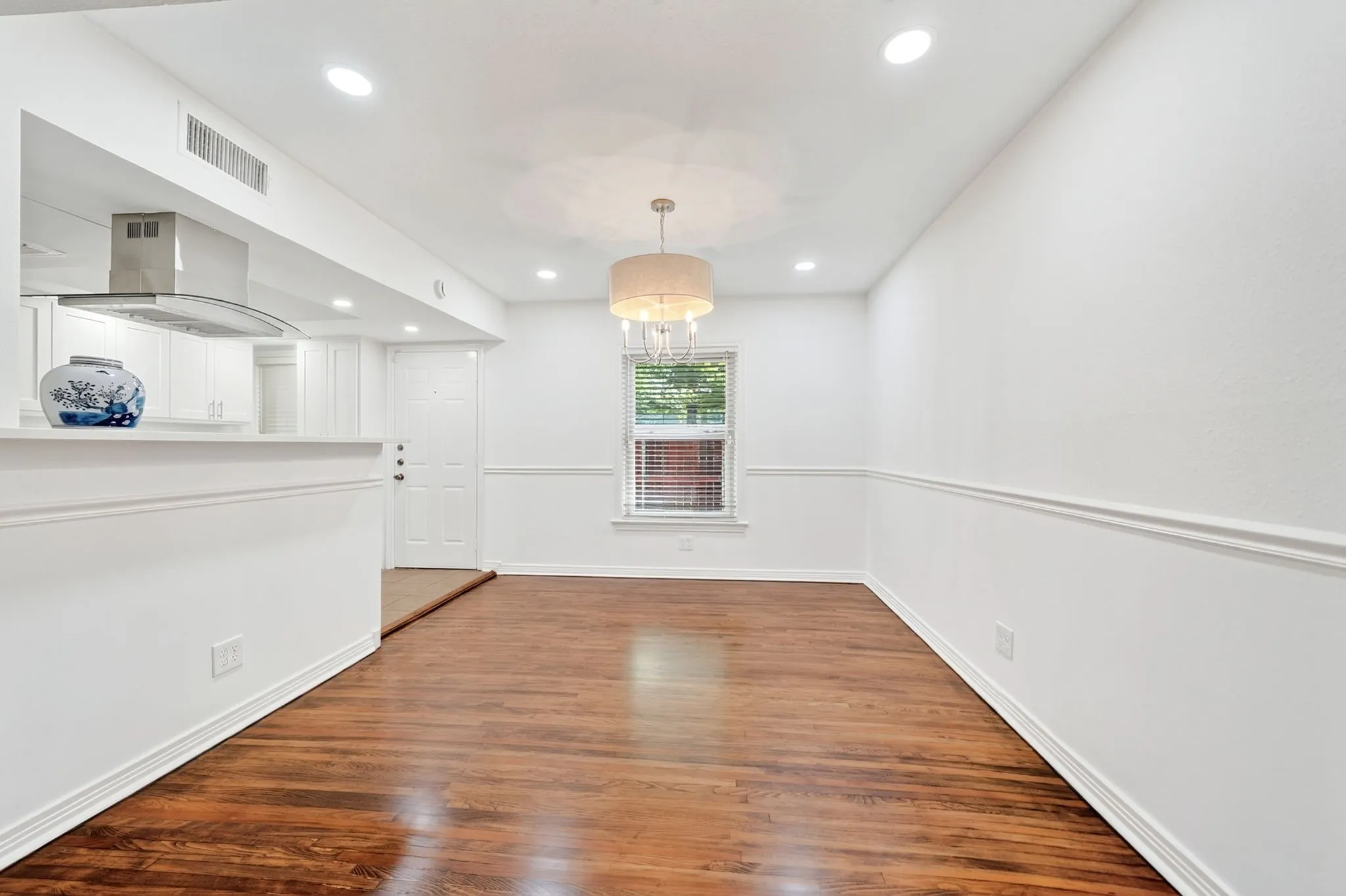 Pull up a seat at the breakfast bar on the left.