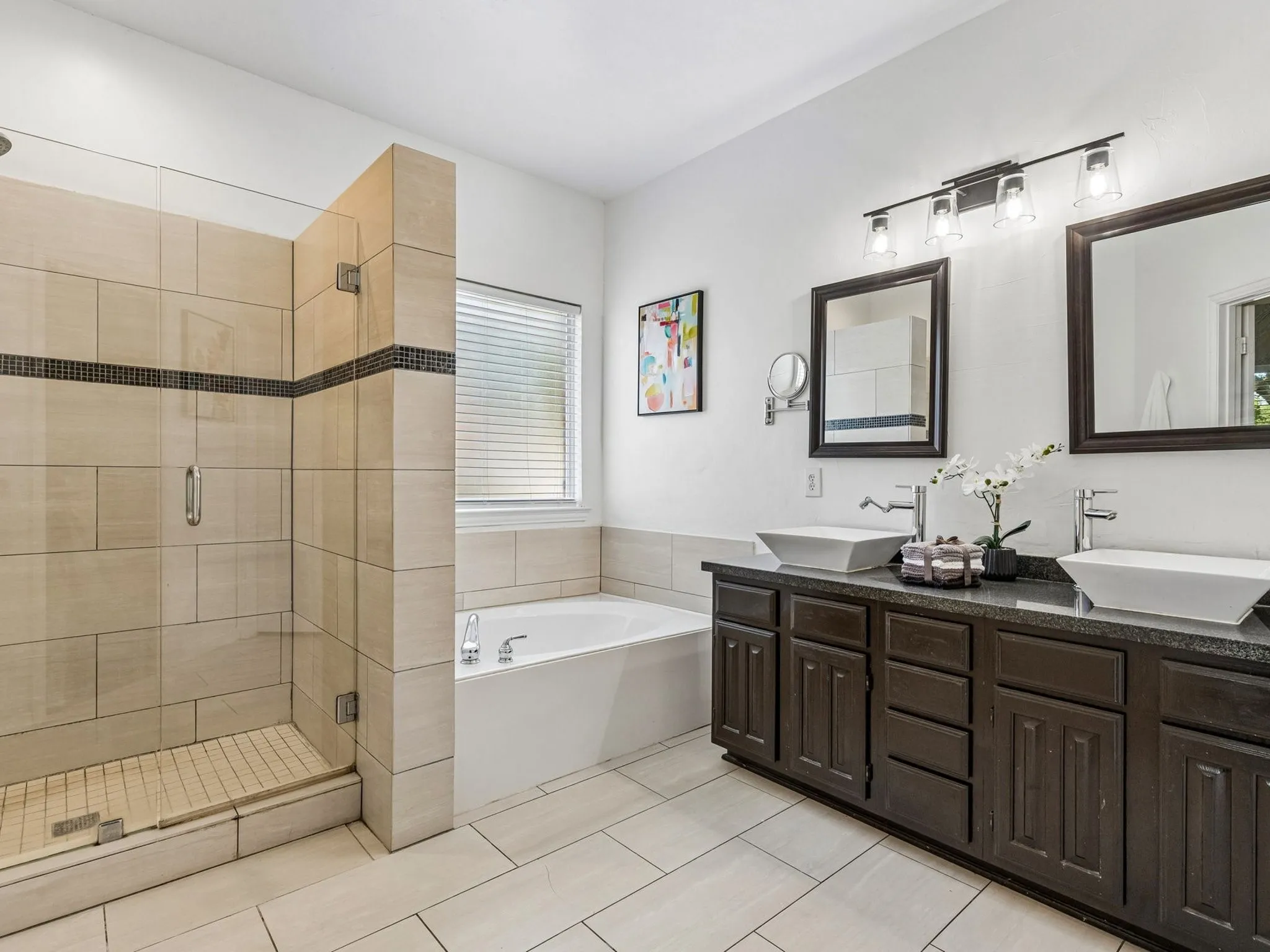 double vessal sinks, large walk in shower AND a soaking tub