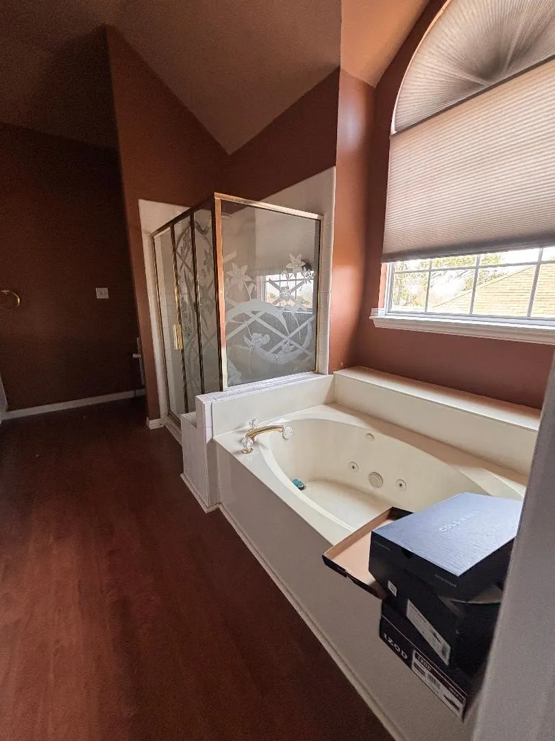 Master bath with separate shower and jetted tub.