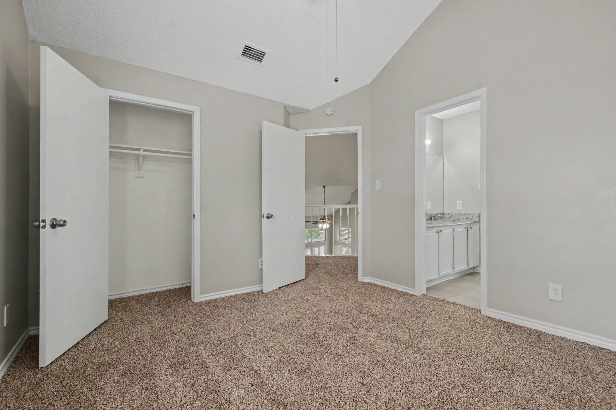 Bedroom #3 with bathroom access and new carpet.