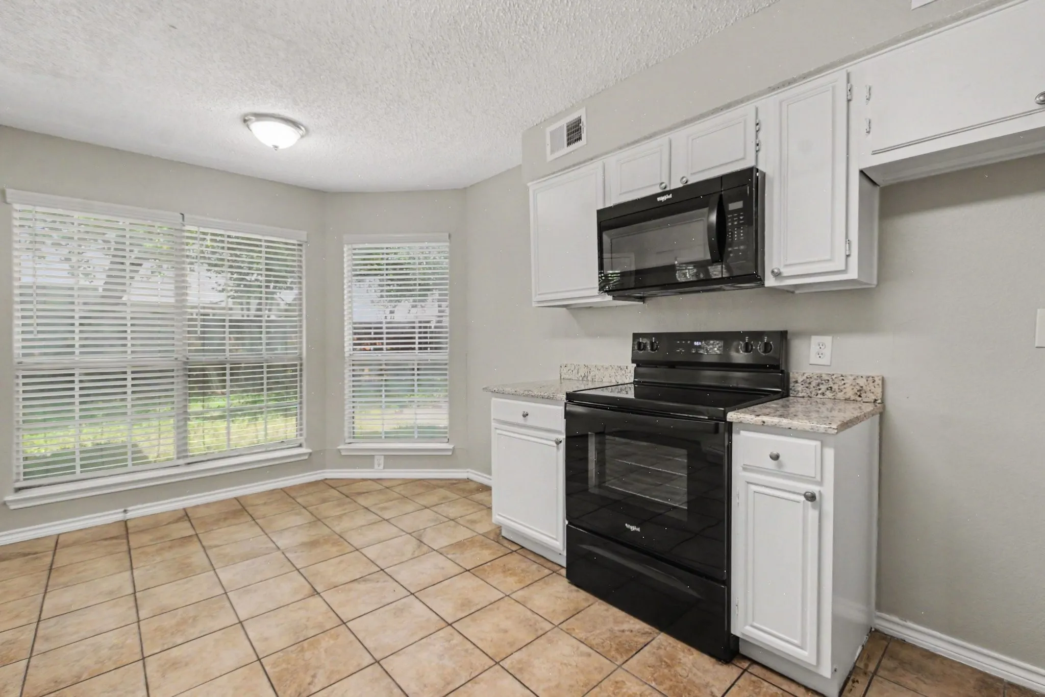 View of kitchen and breakfast area