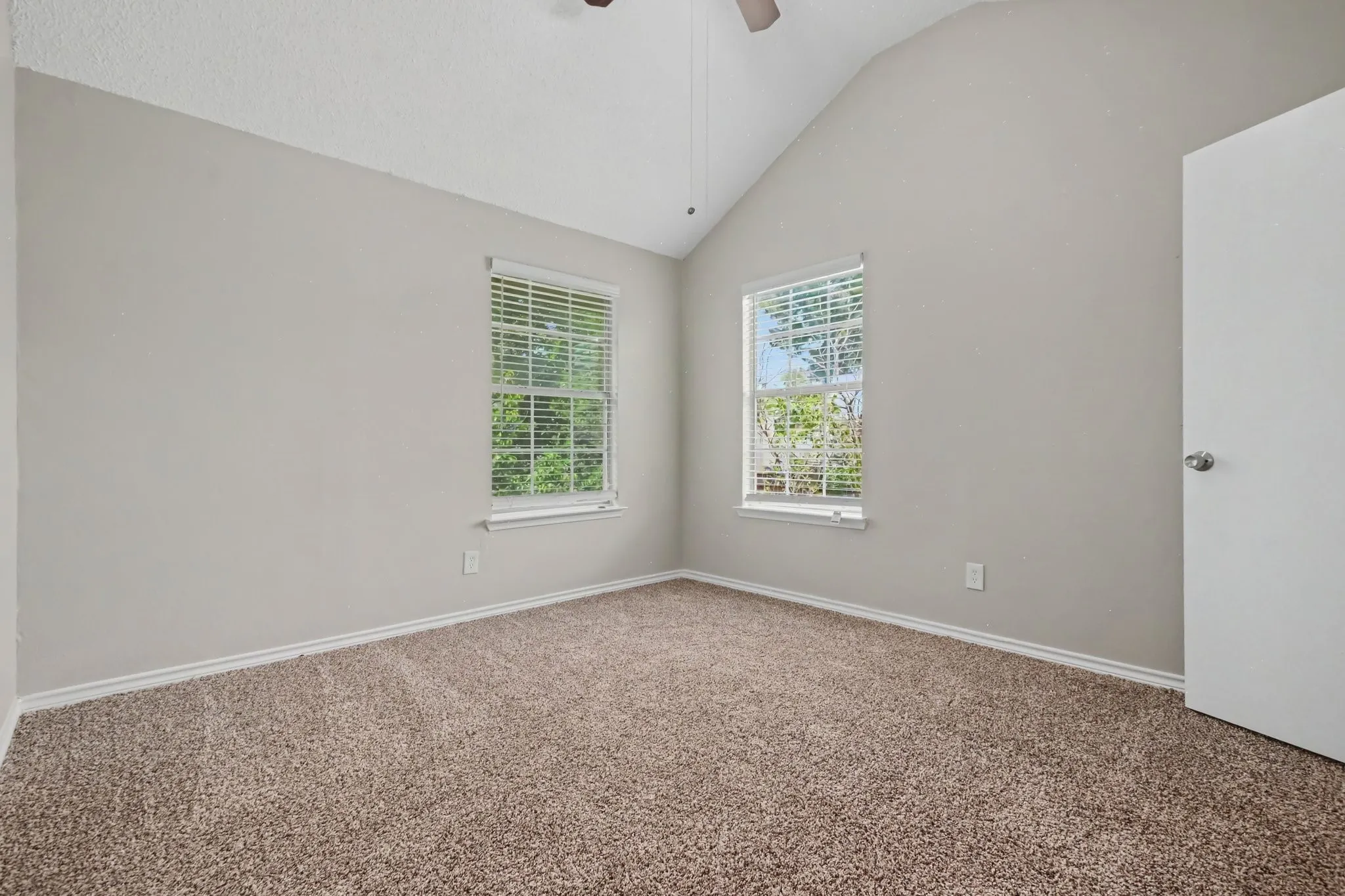 Bedroom #3 with bathroom access and new carpet.