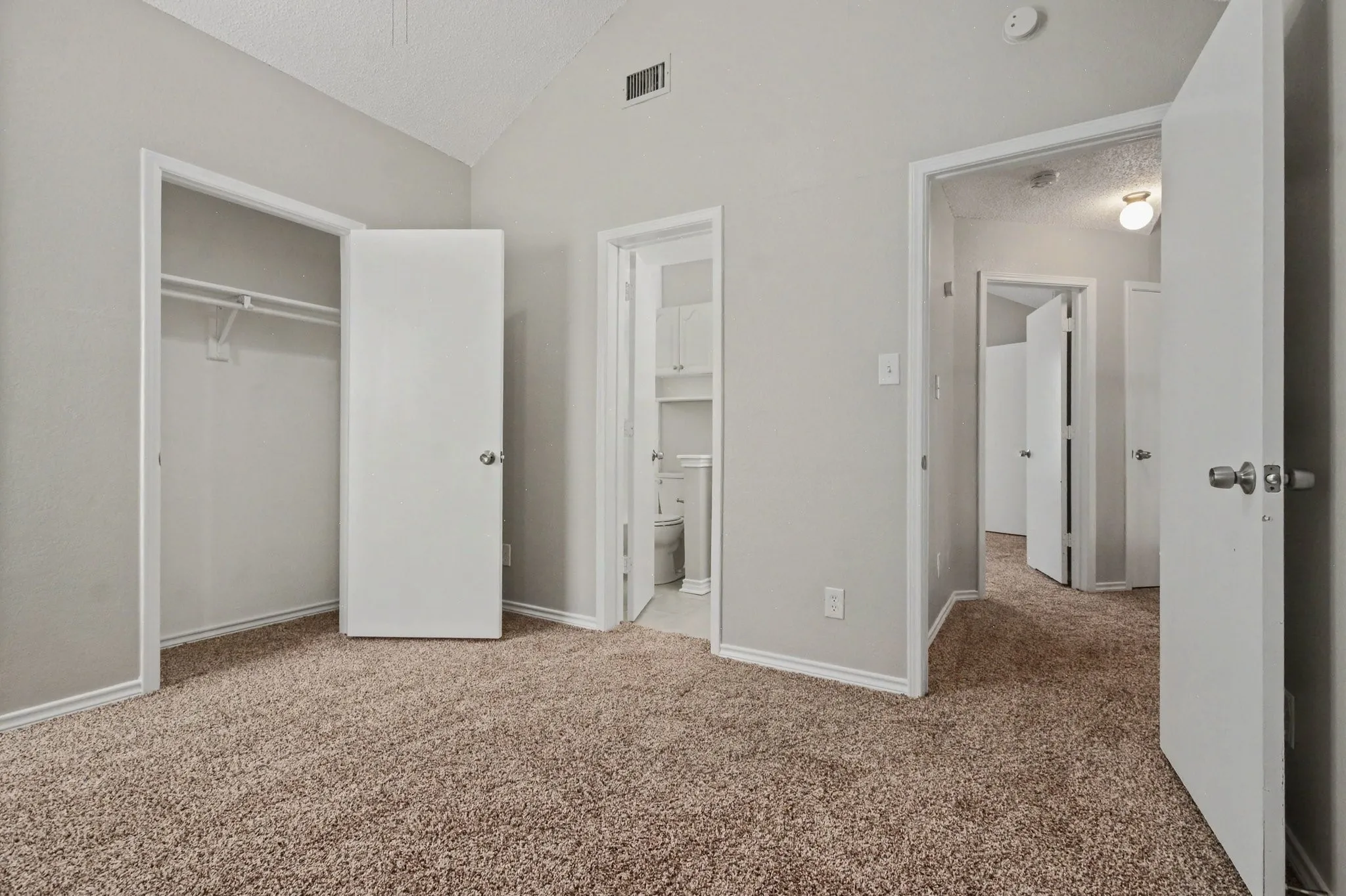 Bedroom #2 with Bedroom #2 access to bathroom and new carpet.