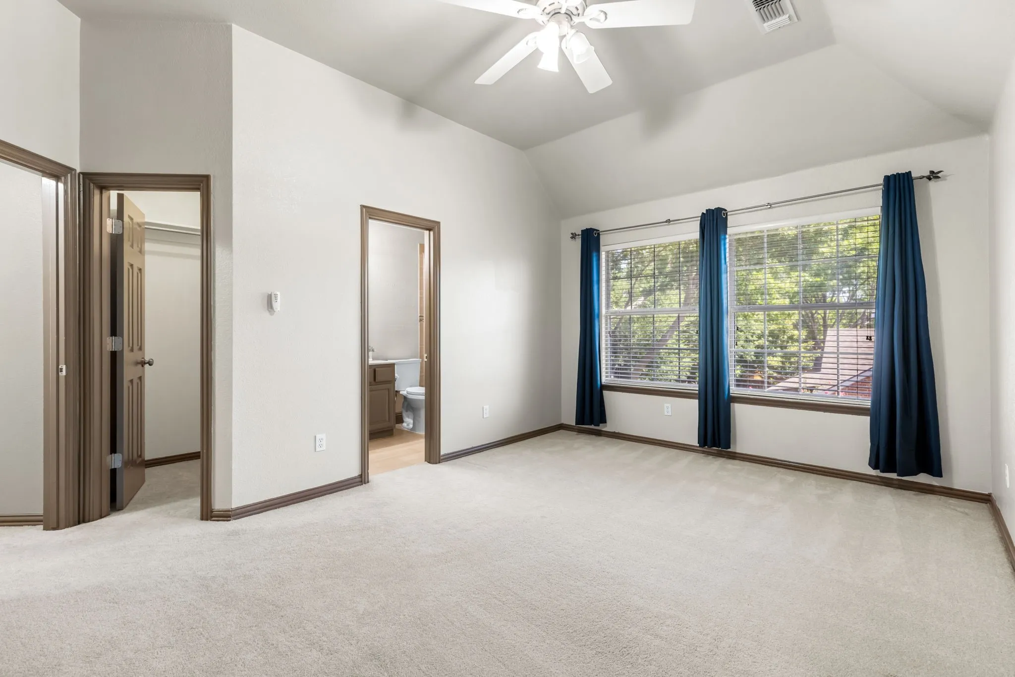 Privately located guest suite upstairs with full bath and large walk-in closet.