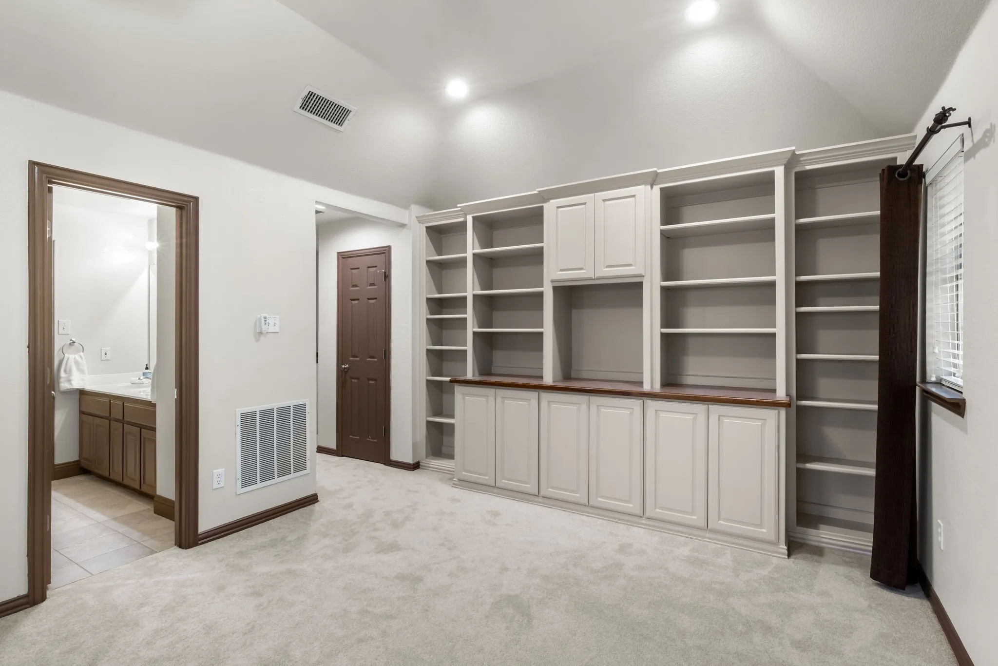 Game Room with built-in storage and bathroom access.