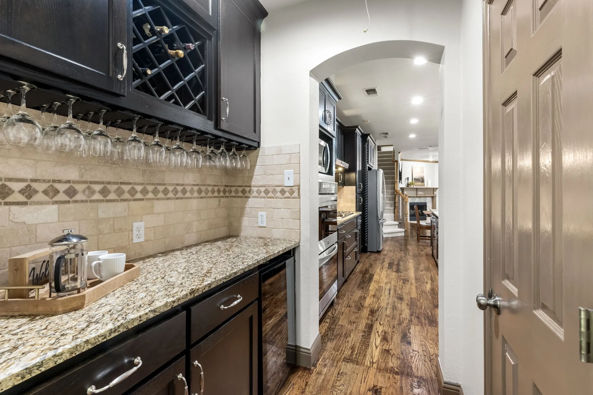 A Butler's Pantry offers additional storage and serving area.  Don't miss the huge walk in pantry!!