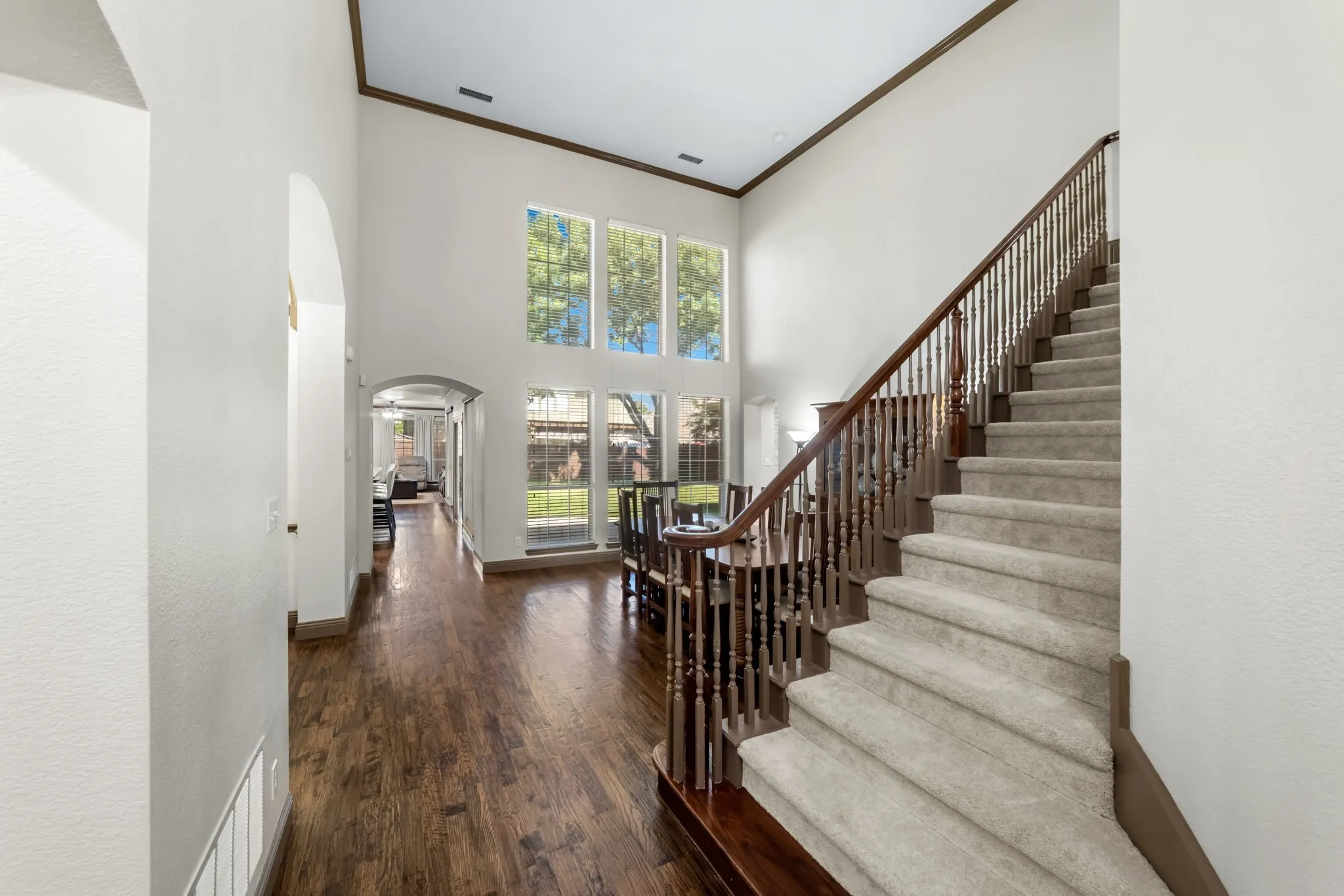 A sweeping staircase leads to 3 bedrooms, Game Room and Bath