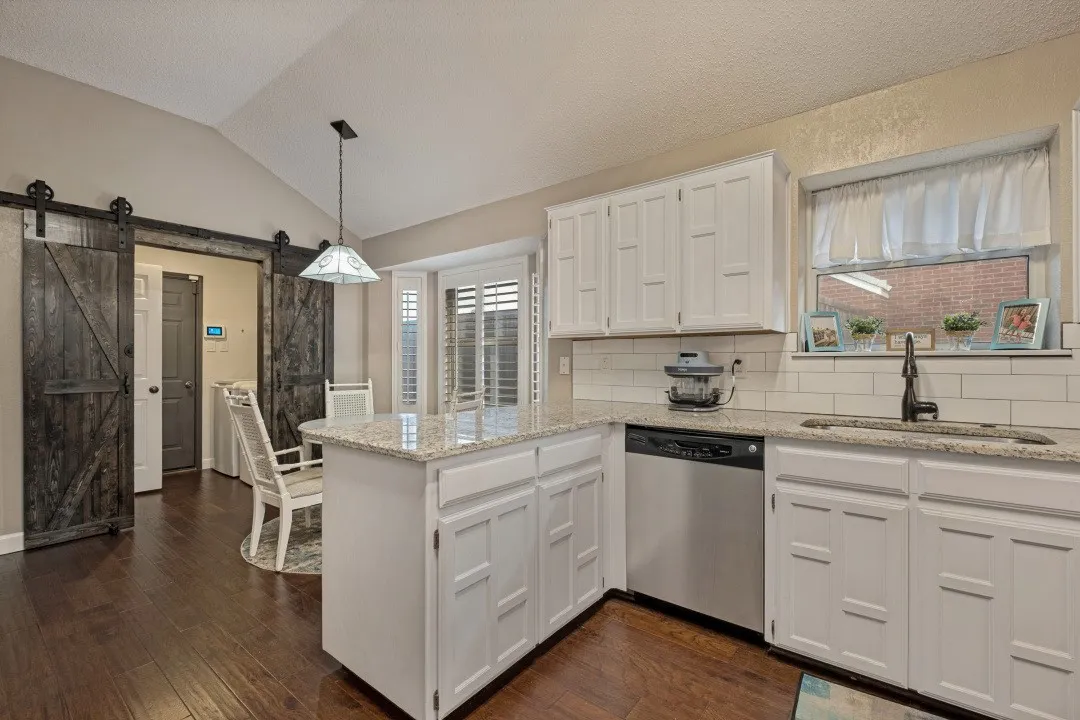 breakfast area opens to kitchen and laundry room