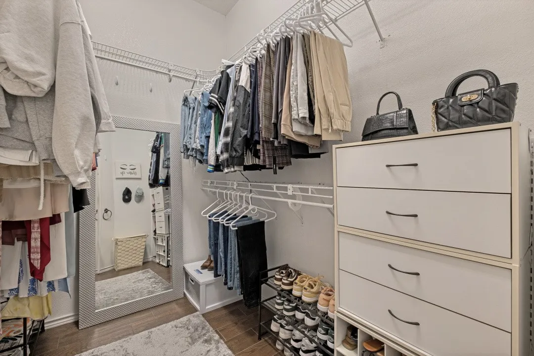 Primary closet with custom built system