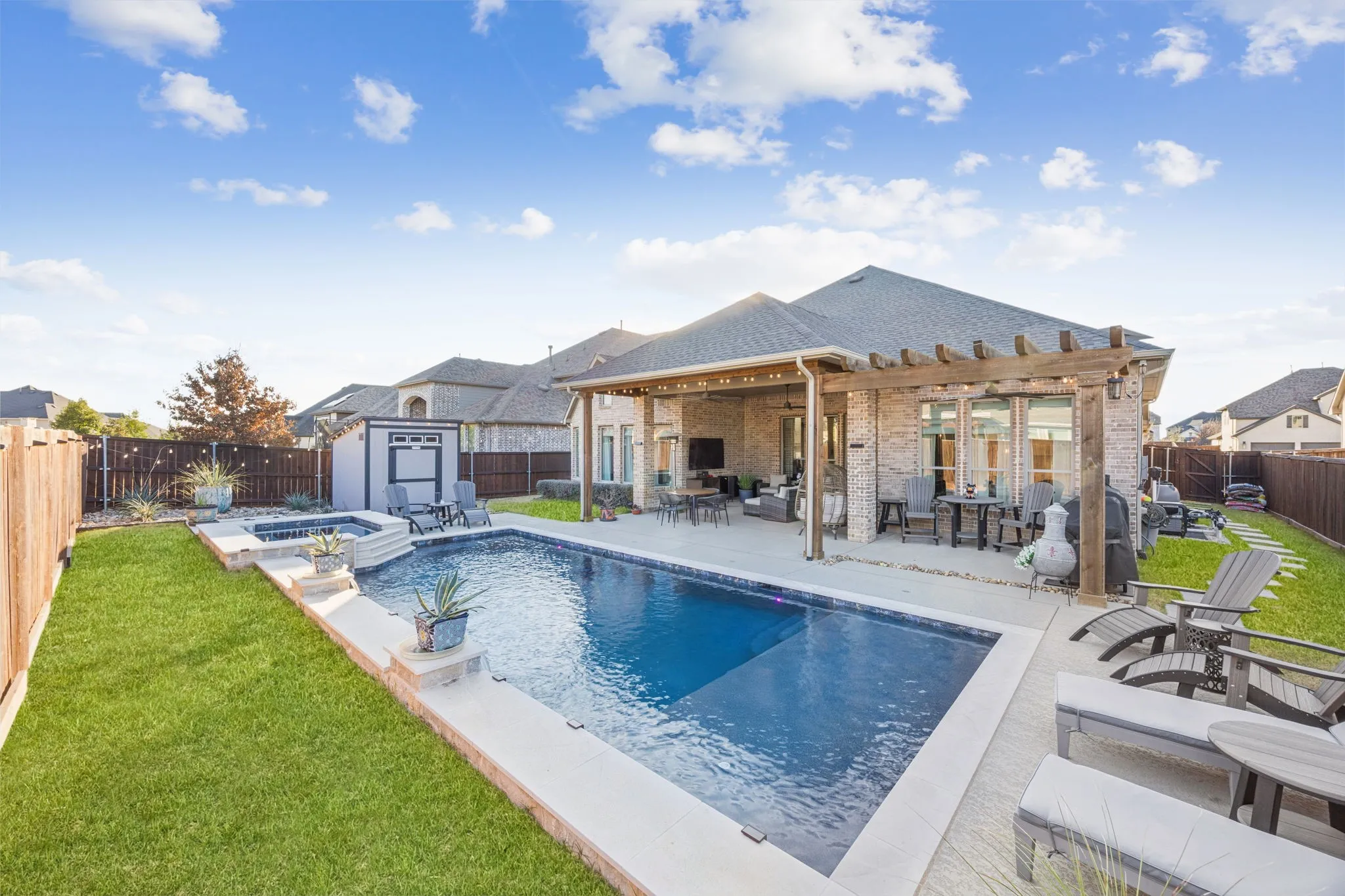 Luxe Outdoor Oasis With Resort-Style Pool, Spa, And Covered Patio