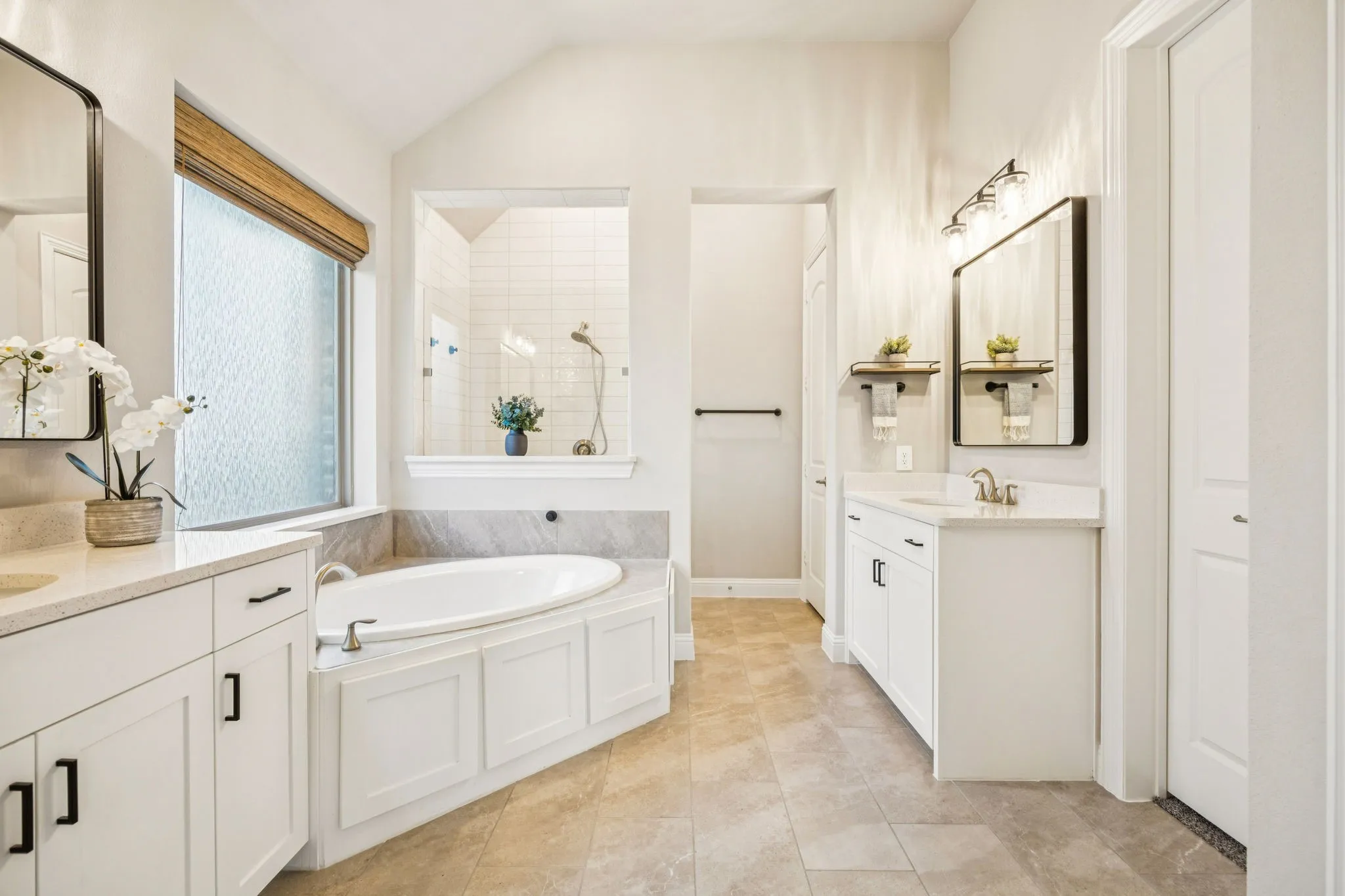 Private Ensuite Featuring Dual Vanities And Walk-In Closet