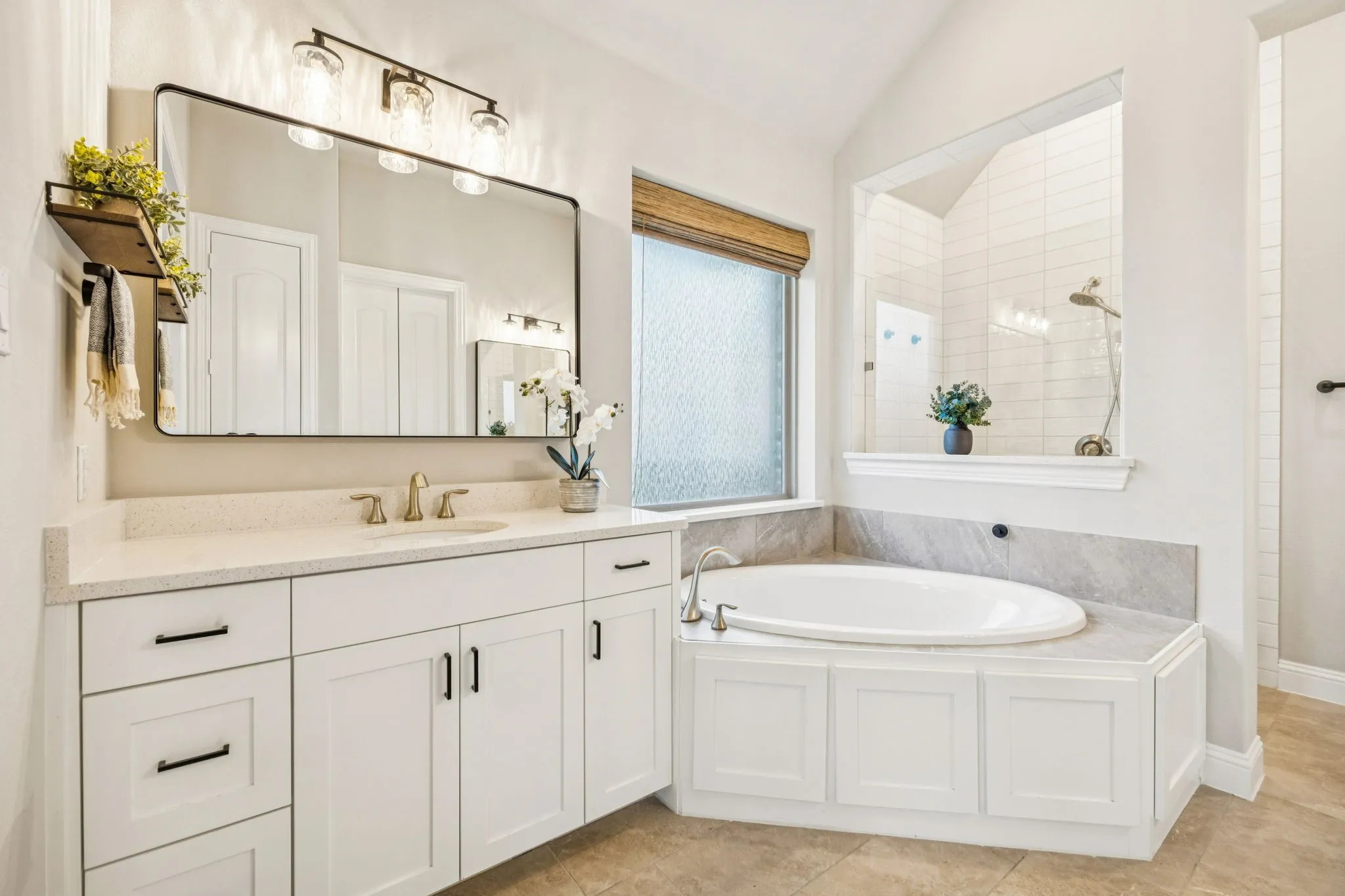 Ensuite Bath Featuring Privacy Glass, Soaking Tub, Dual Vanities, And Spacious Walk-In Closet
