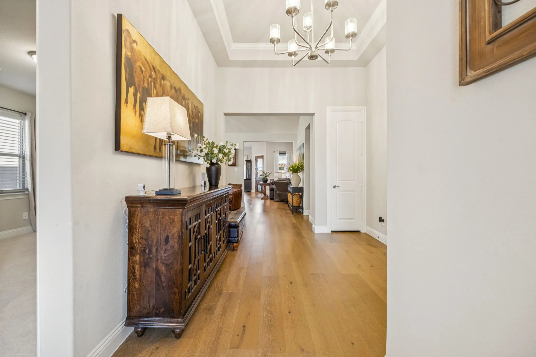 Light Oak Hardwood Flooring Welcomes With High Ceilings