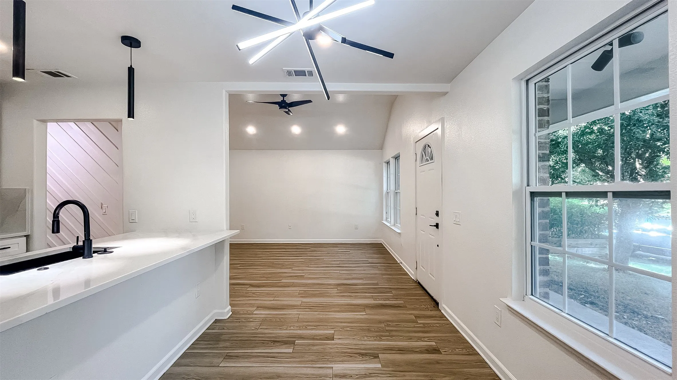 Expansive view from the kitchen looking out into the main living areas—ideal for family gatherings.