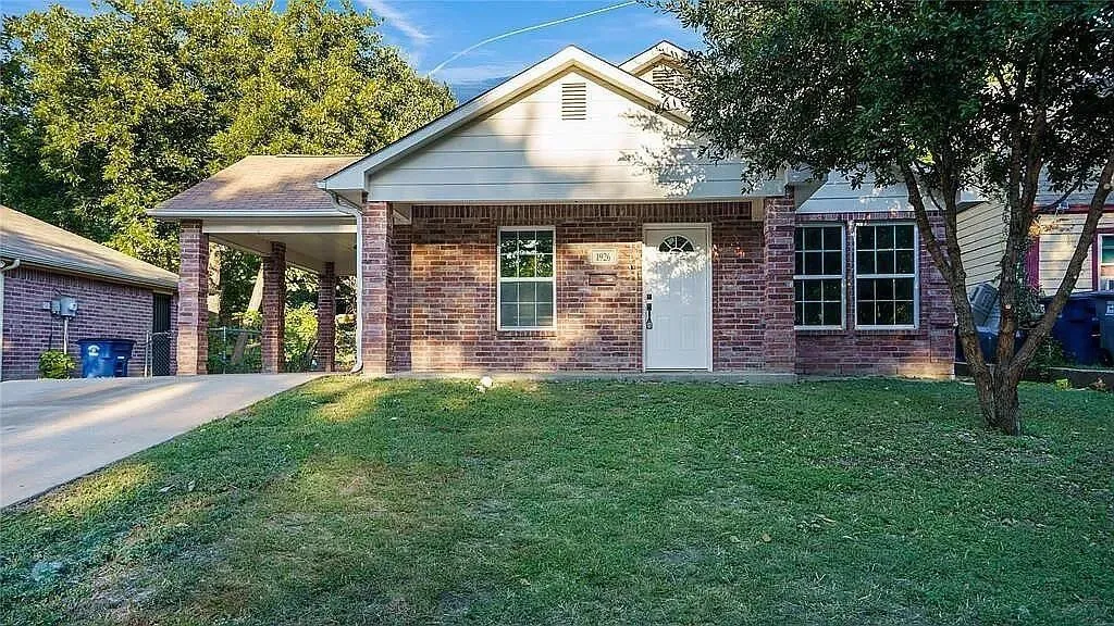 Solid single-story brick home set back on a quiet, peaceful East Texas lot.