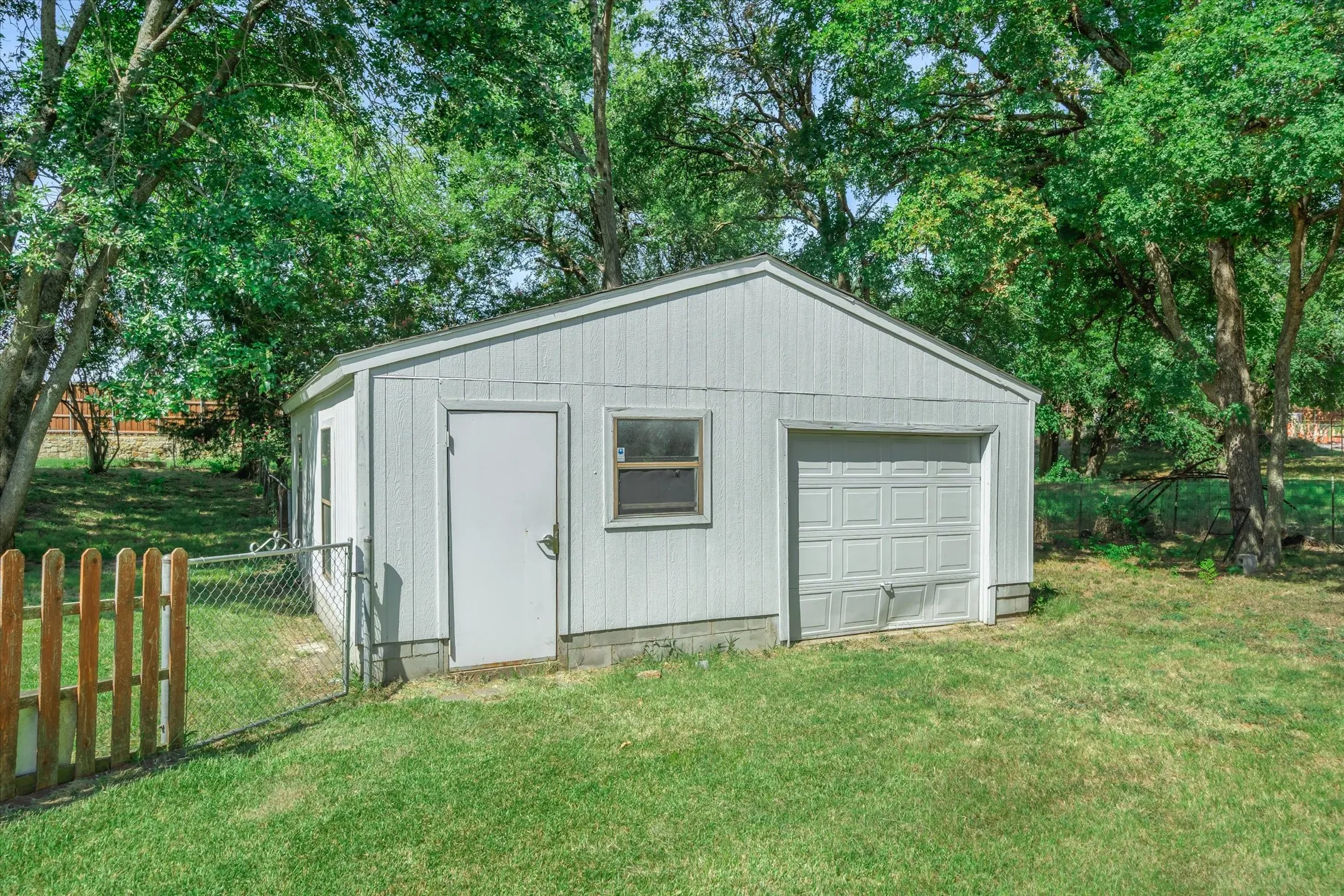 25 X 25 shop with roll-up and walk through door. Electric is in place.