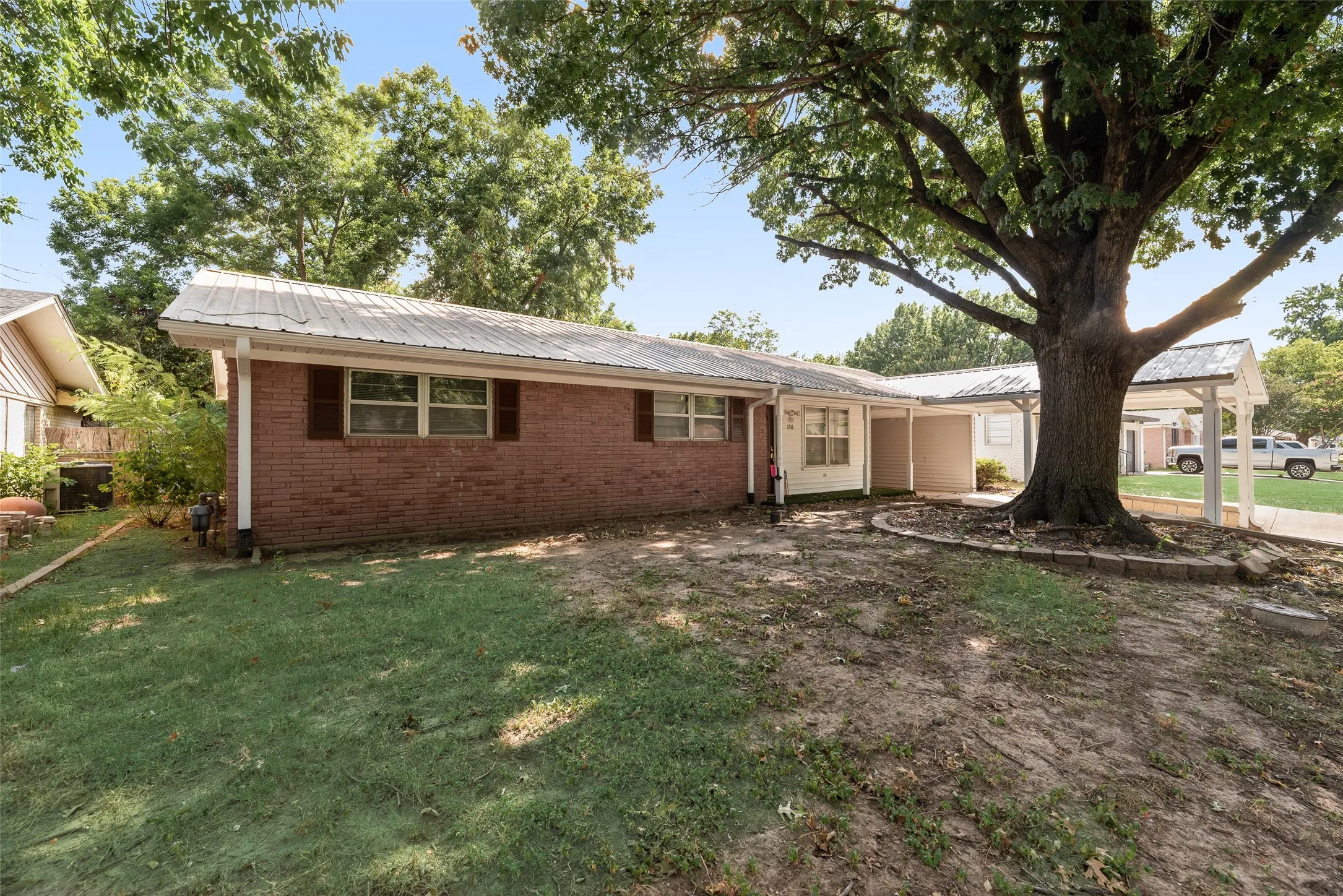 Brick exterior with a metal roof