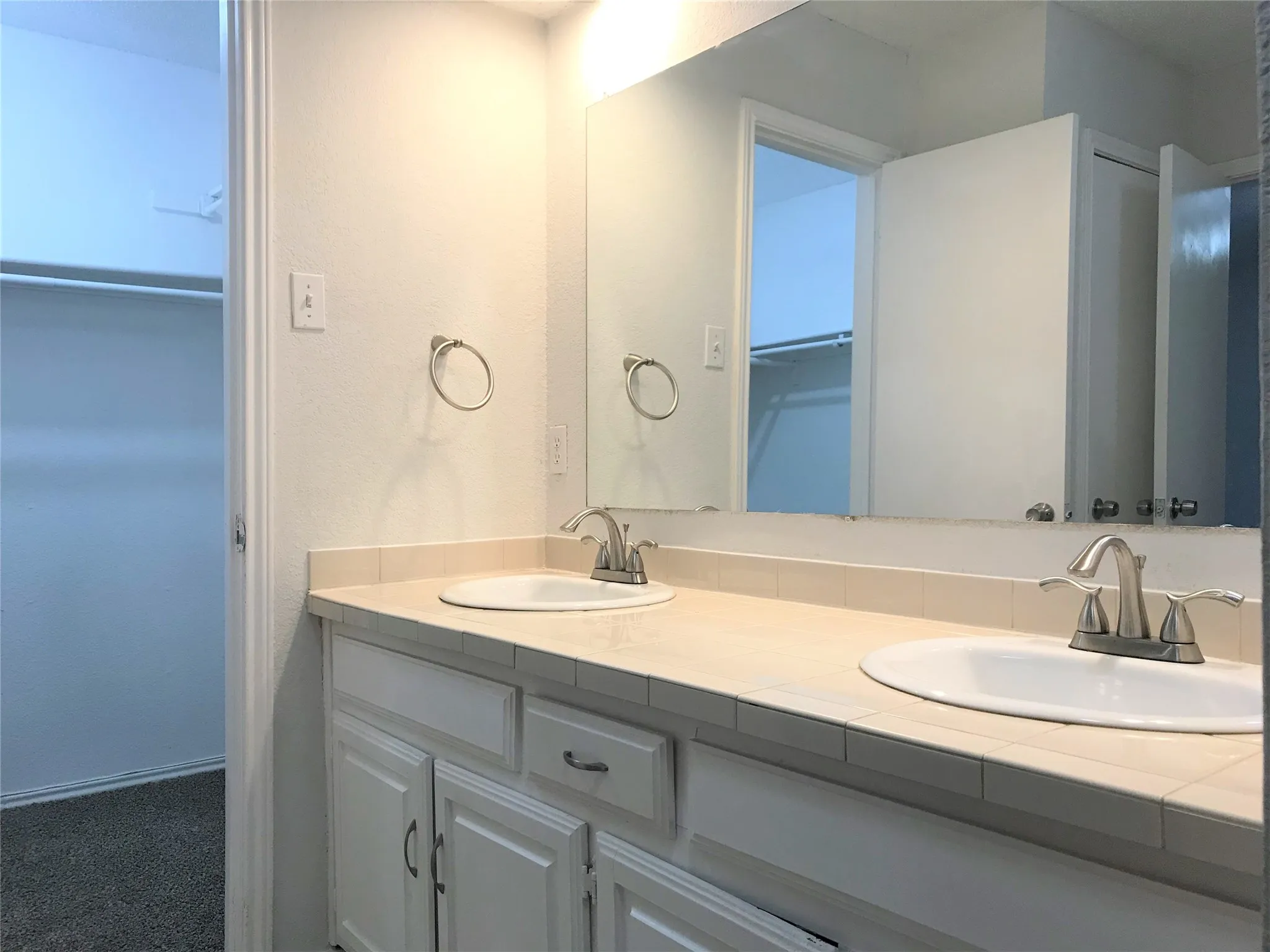 Master bedroom has dual sinks