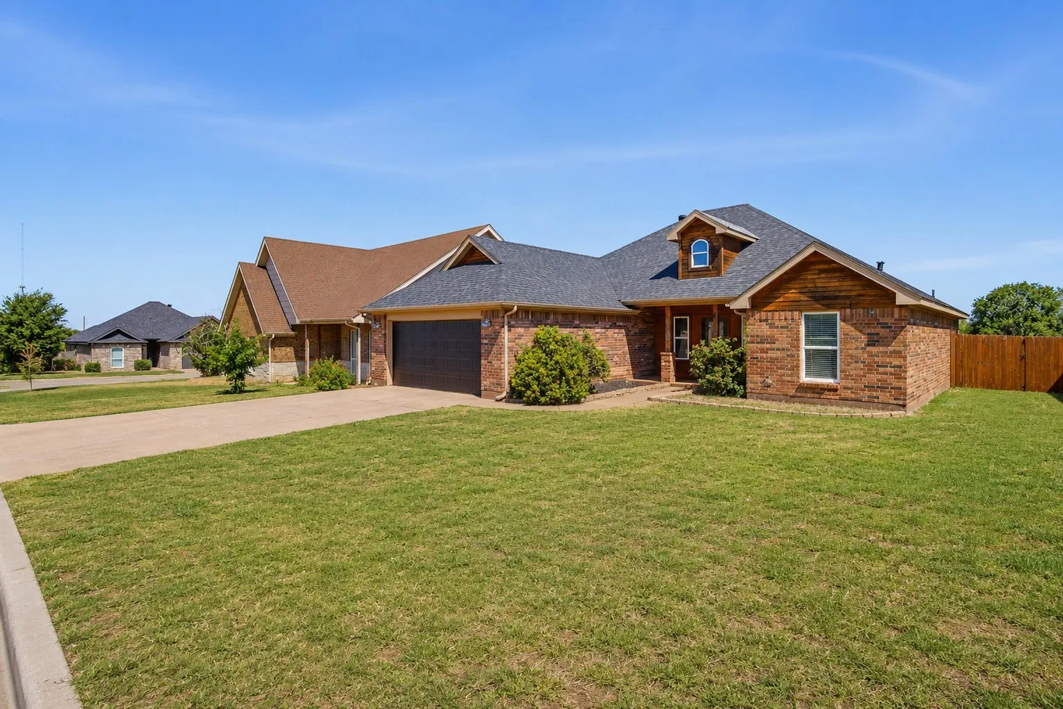 Brick exterior with wood-finish siding accents
