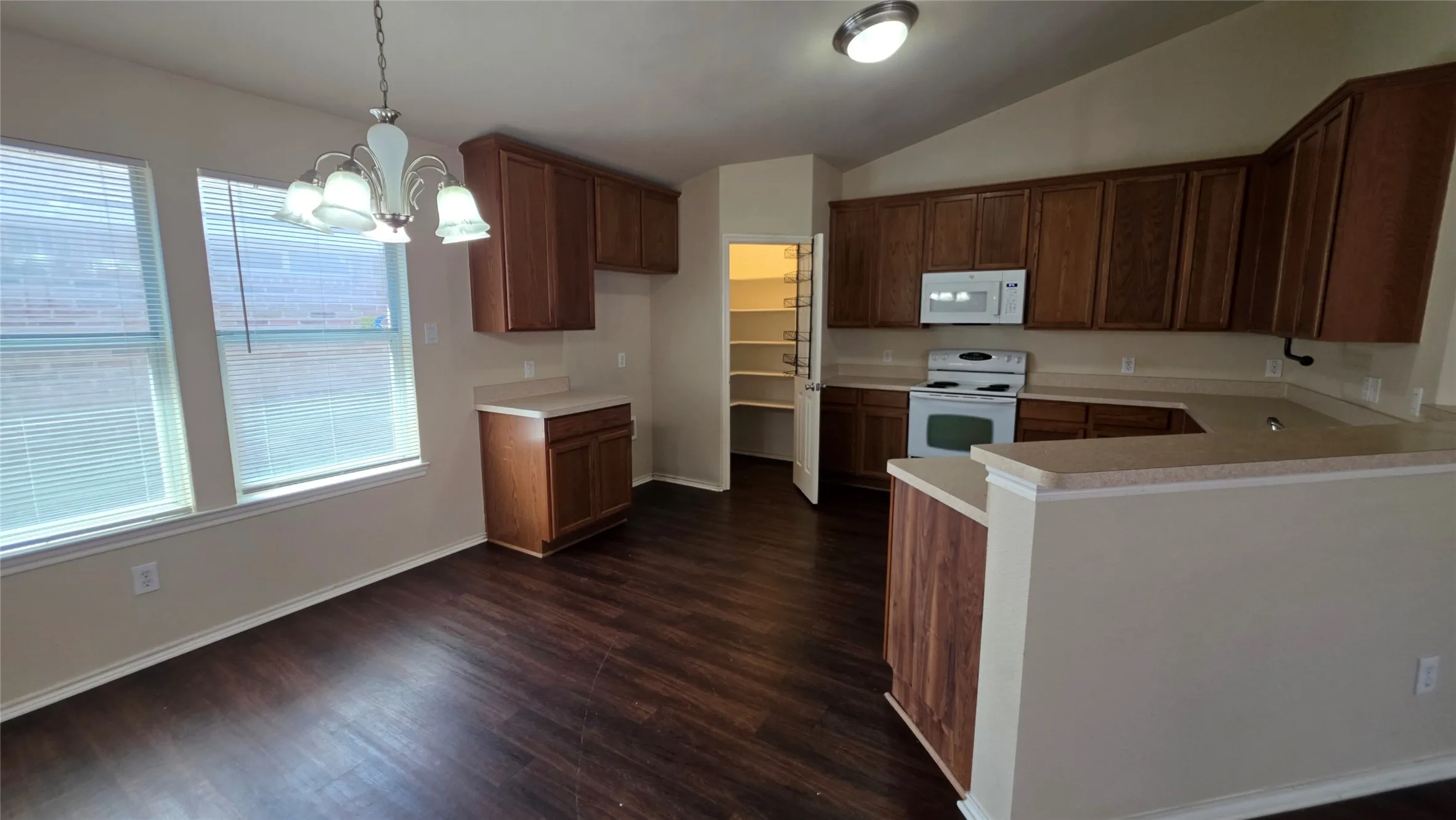 Kitchen has space for your favorite refrigerator.