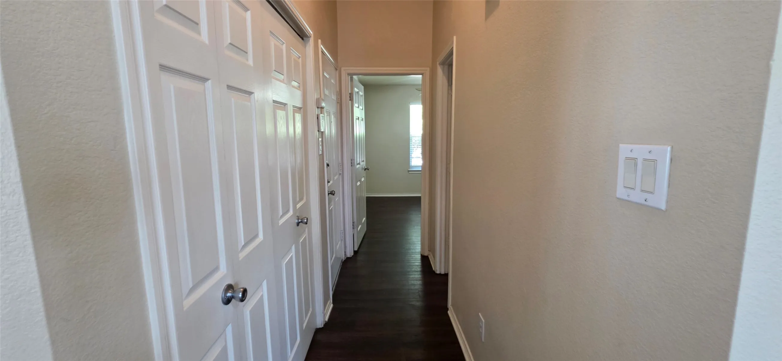 Folding doors keep the utility closet out of sight.