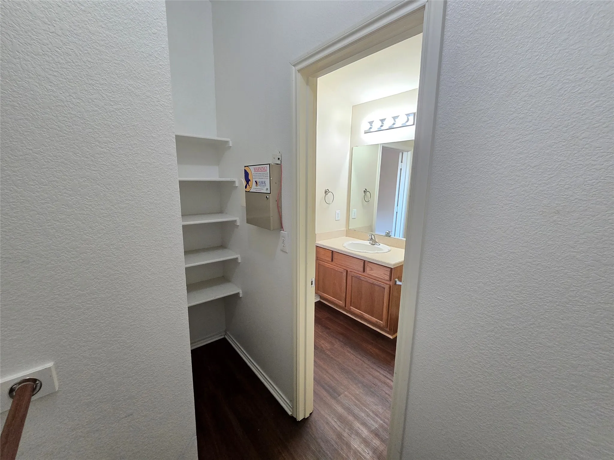 Walk-in closet also has built-in shelves!