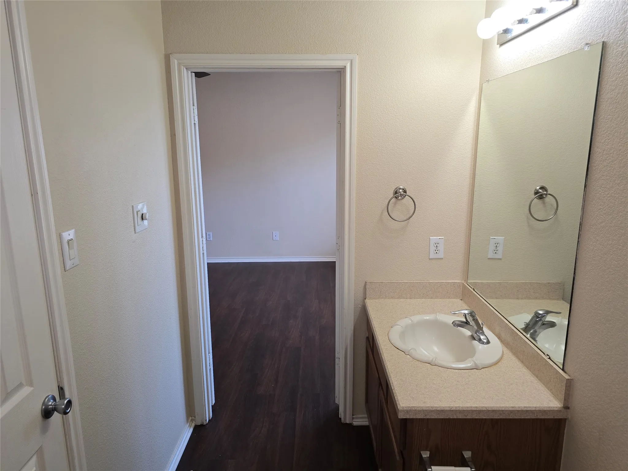 Main ensuite bathroom has a storage vanity.
