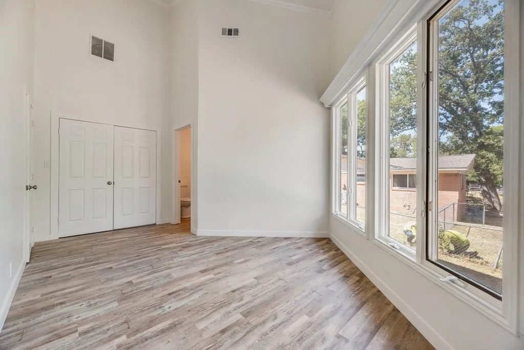 Bedroom/office space that includes an attached bathroom for privacy.