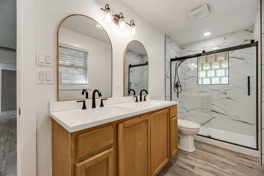 Double sinks and gorgeous updated shower.