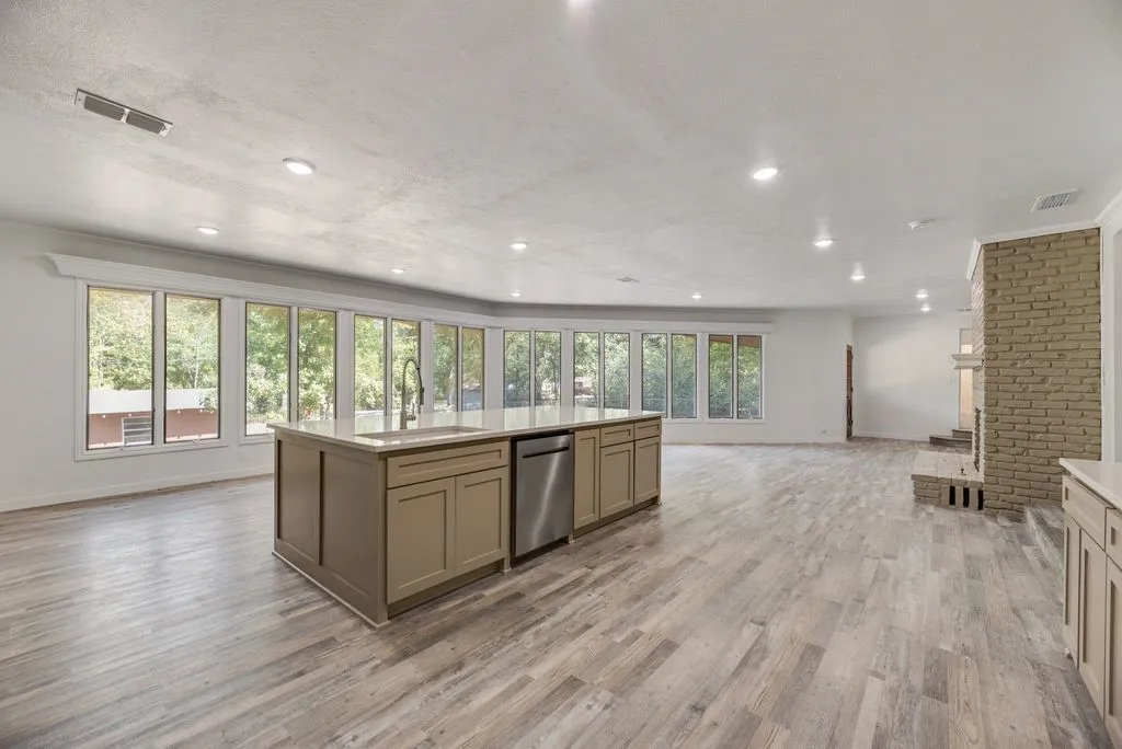 Check out the size of that island and all of that natural light!