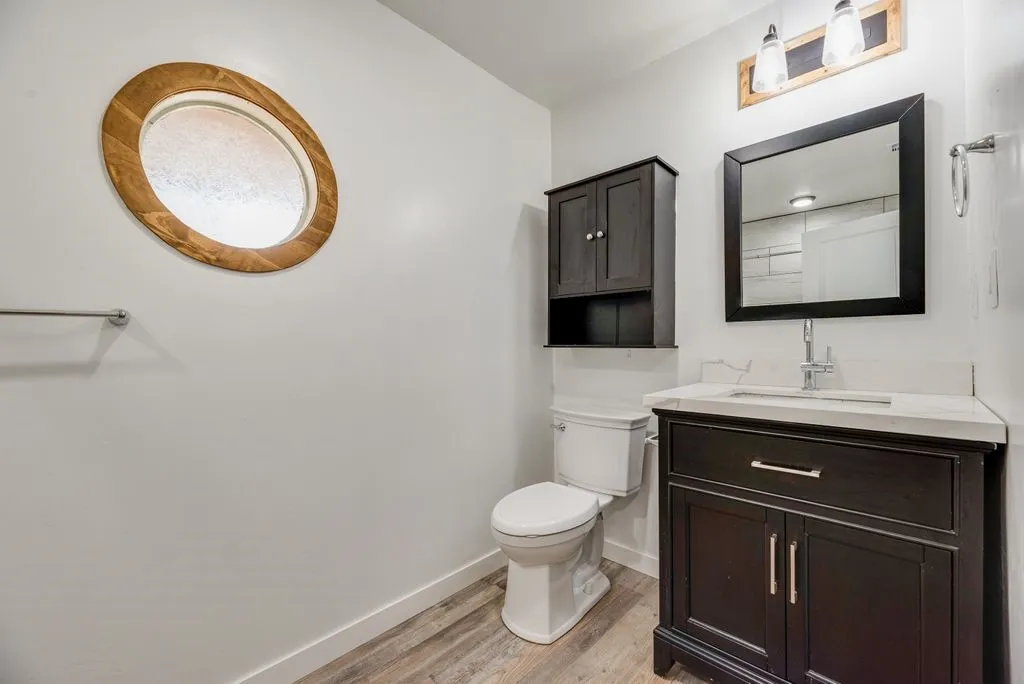 Guest bathroom that is accessed from the hallway.