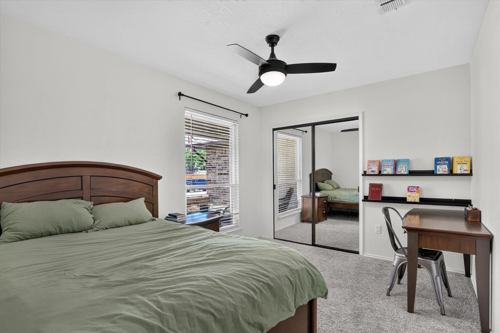 White walls with a ceiling fan light fixture