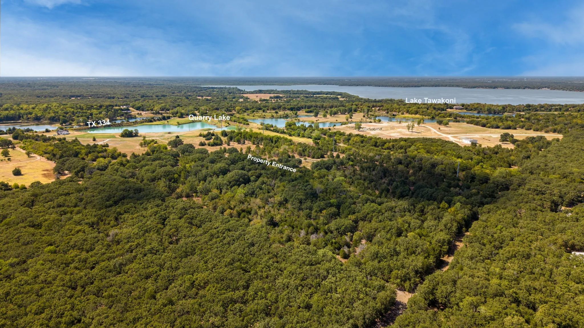 Expansive wooded property featuring a natural landscape and direct access