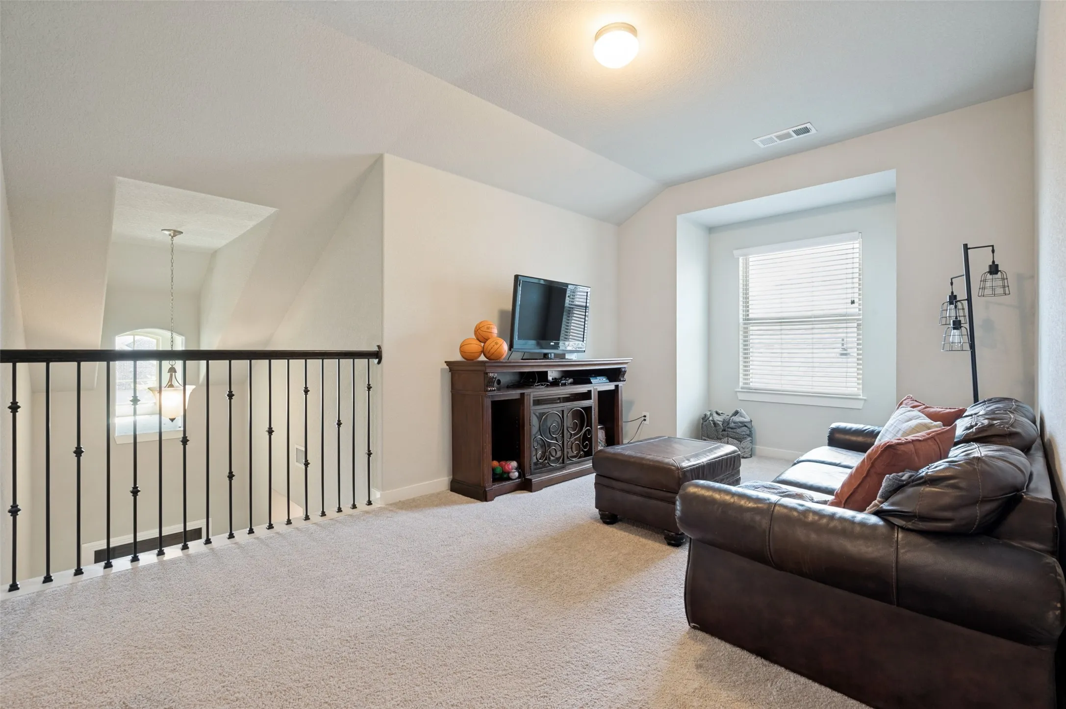 The versatile loft can serve as a second living area, game room, study, craft space or playroom.