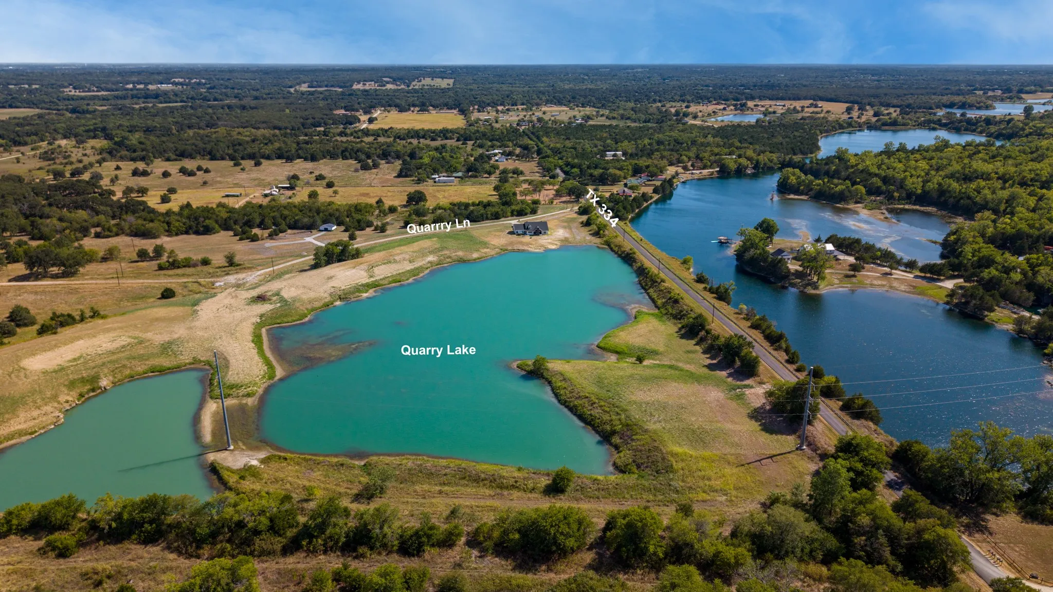 Expansive land parcel featuring multiple lakes and wooded areas