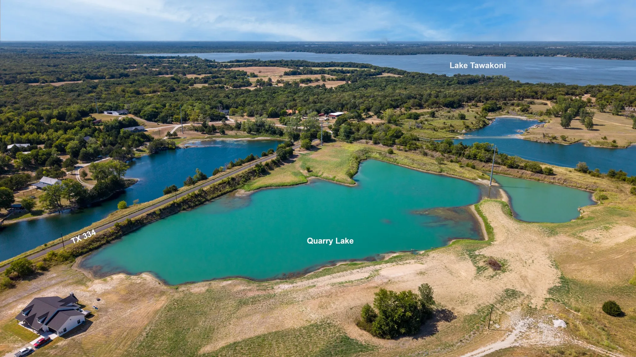 Aerial perspective encompassing multiple bodies of water, including Quarry Lake and Lake Tawakoni