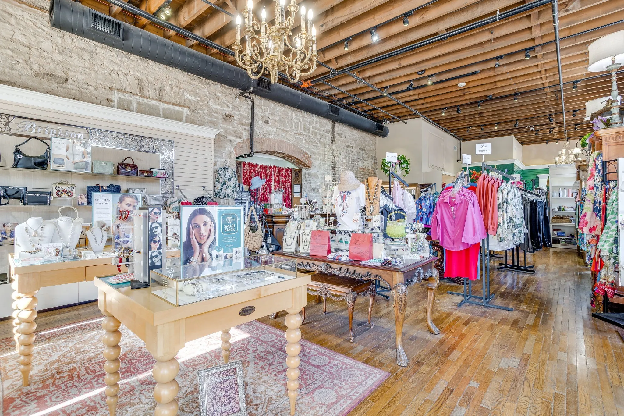 The stone wall and original ceiling beams provide the rich history associated with this building.
