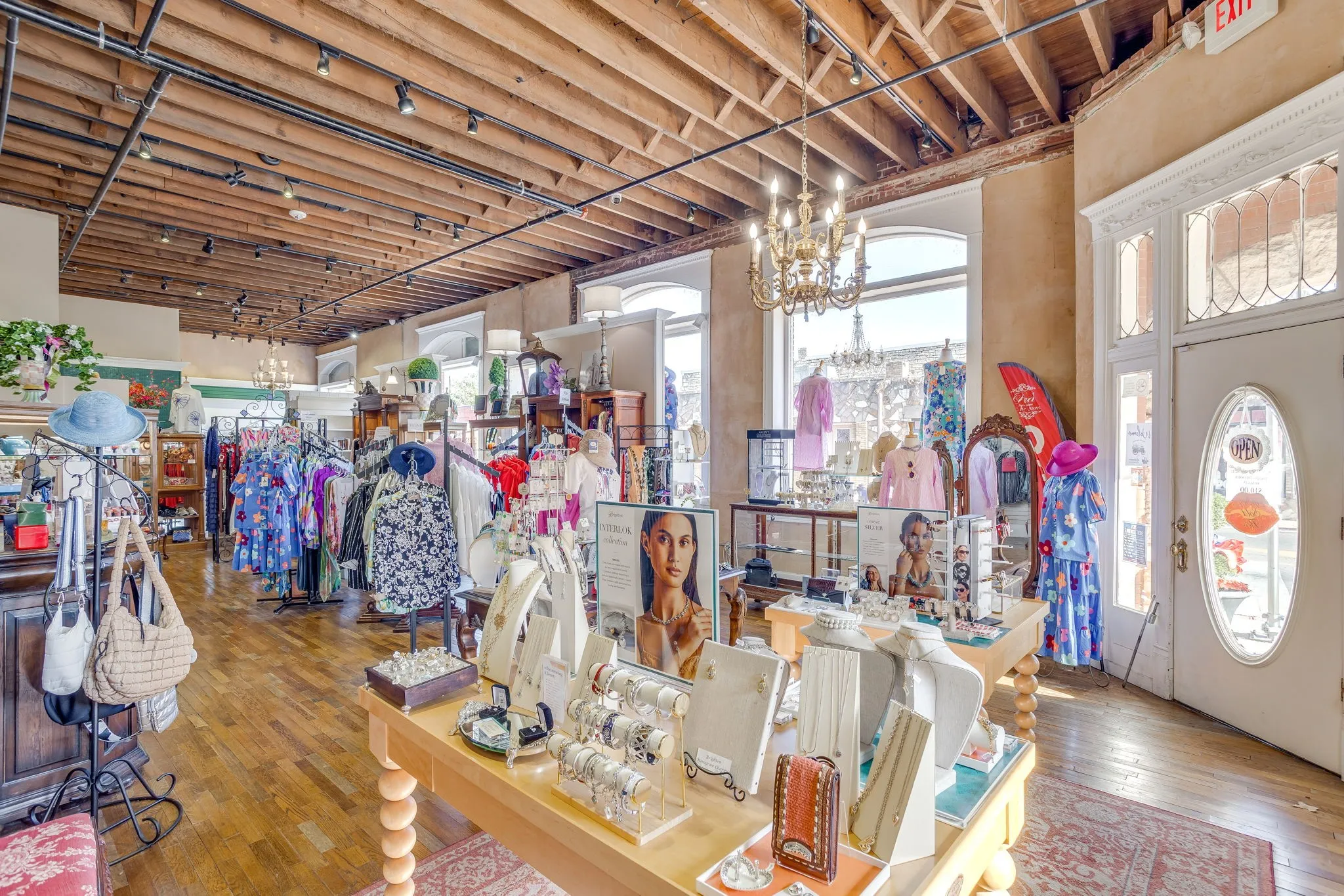 The downstairs space is currently being operated as a women's clothing boutique. However, the end-uses for this building are many. A pub, corner restaurant, speak-easy, or whatever you can dream of!