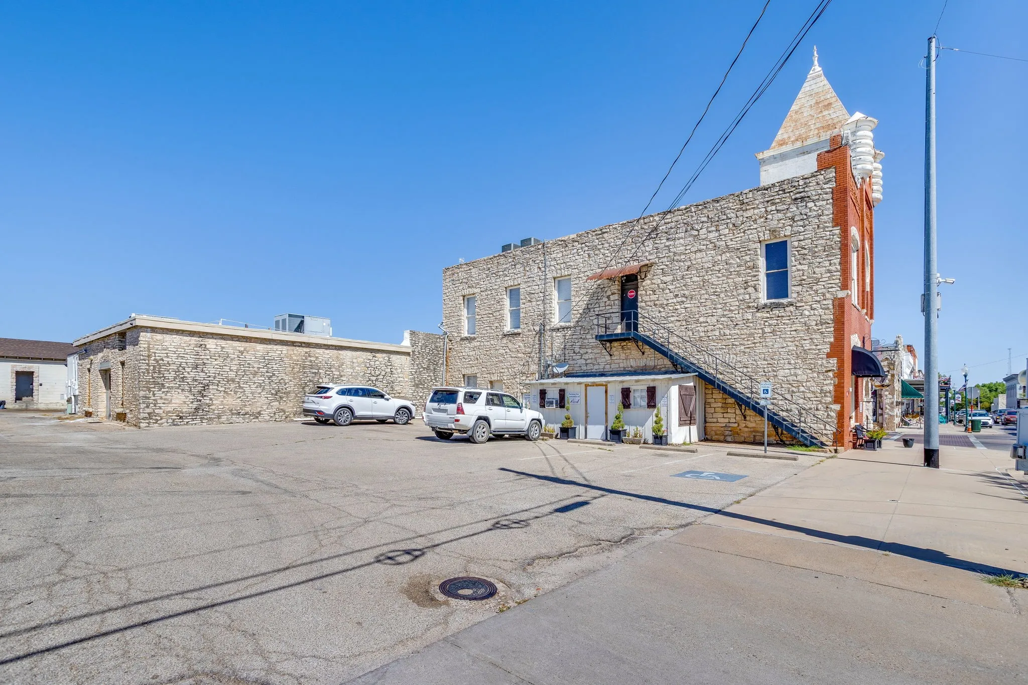 The owners purchased this additional parking area that provides 7 private parking spaces. This is GOLD for any business owner on the Square.