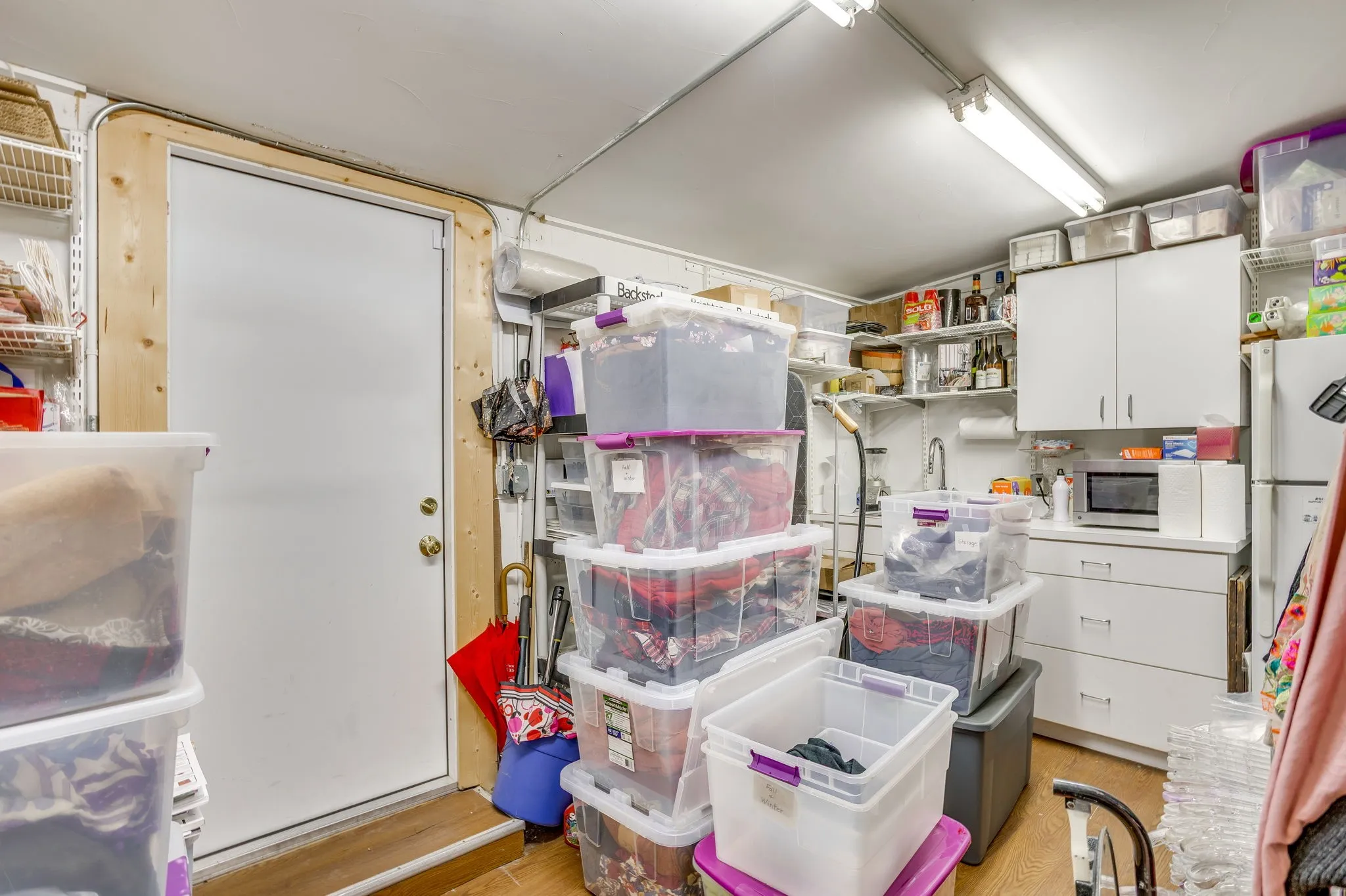 This is the added storage area with direct access to the back parking lot.