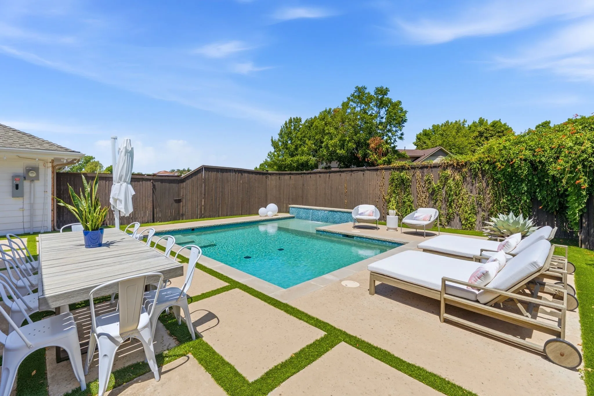 Modern pool with turf grass