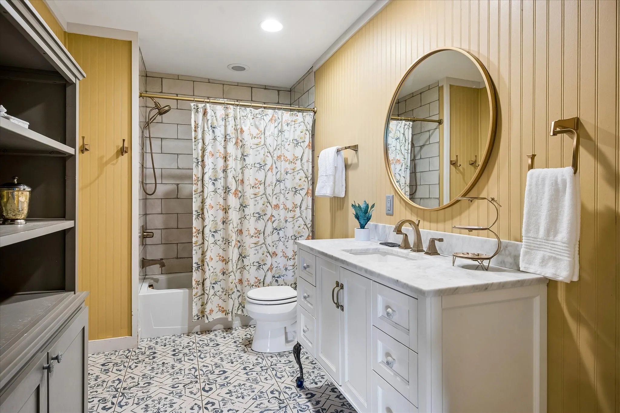 Charming full bath with a tub.