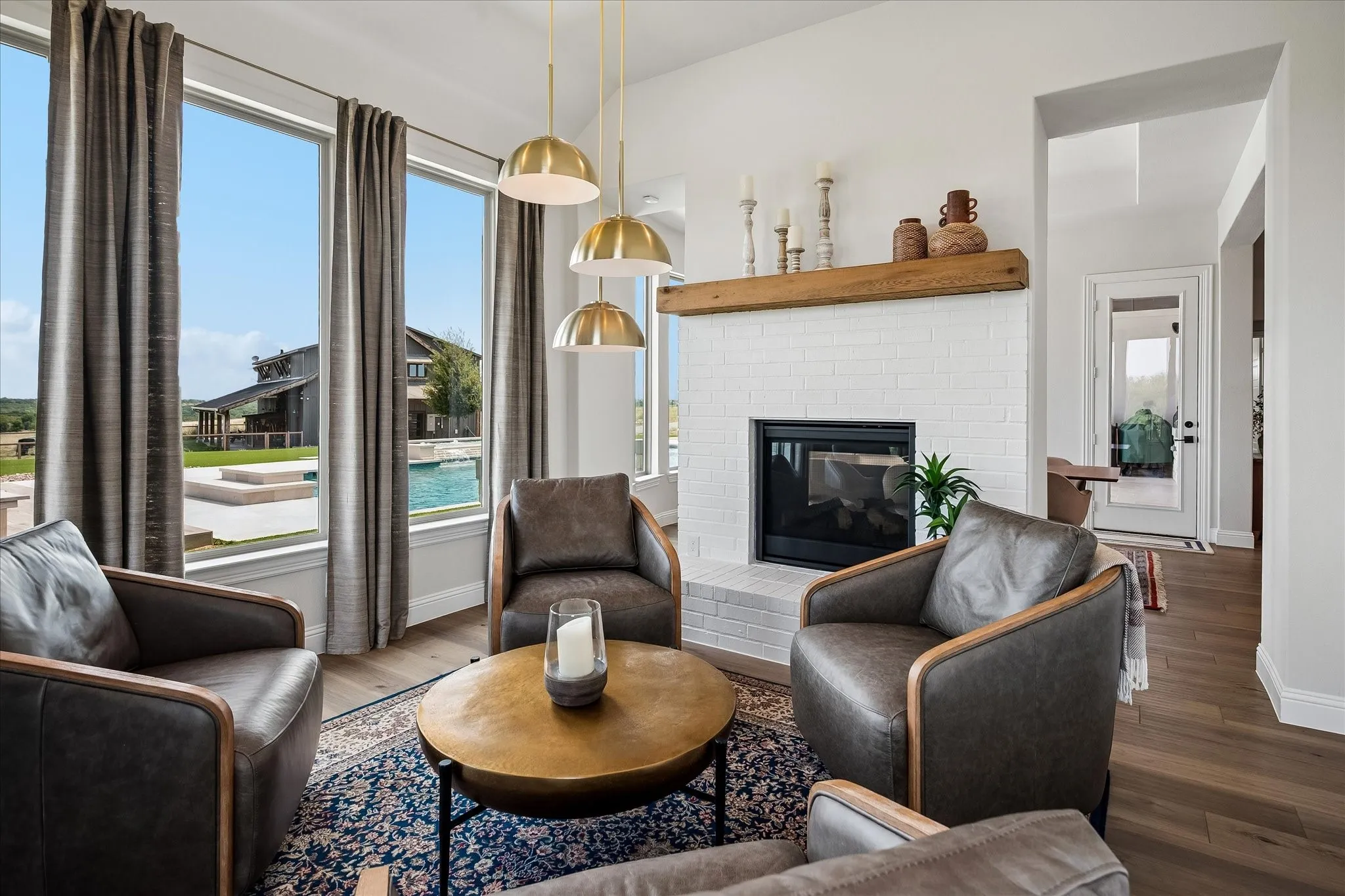 The lounge which everyone loves to hang out in! Double sided gas fireplace for the occasional chilly morning or evening ambiance. Terrific views and lots of natural light.